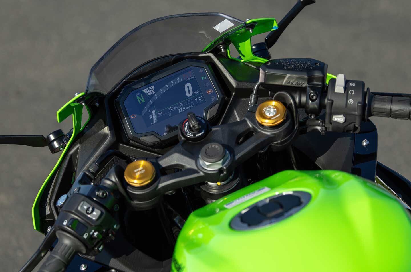 In this cockpit view, you can see the easy to access adjusters on top of the fork tubes.