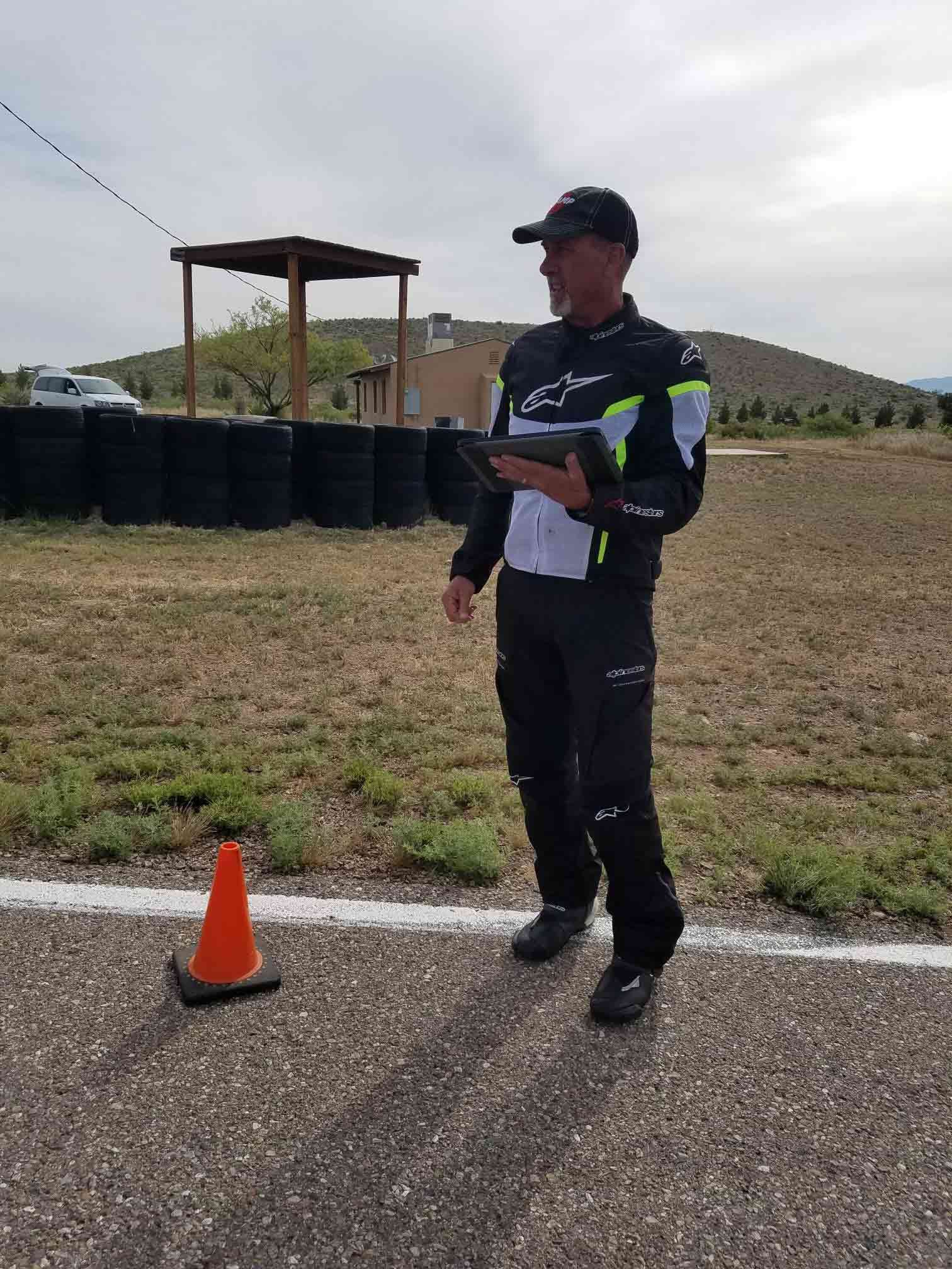Mark Schellinger with his iPad practicing lines for the Pointy End drill in between Inde’s turns 5 and 6.