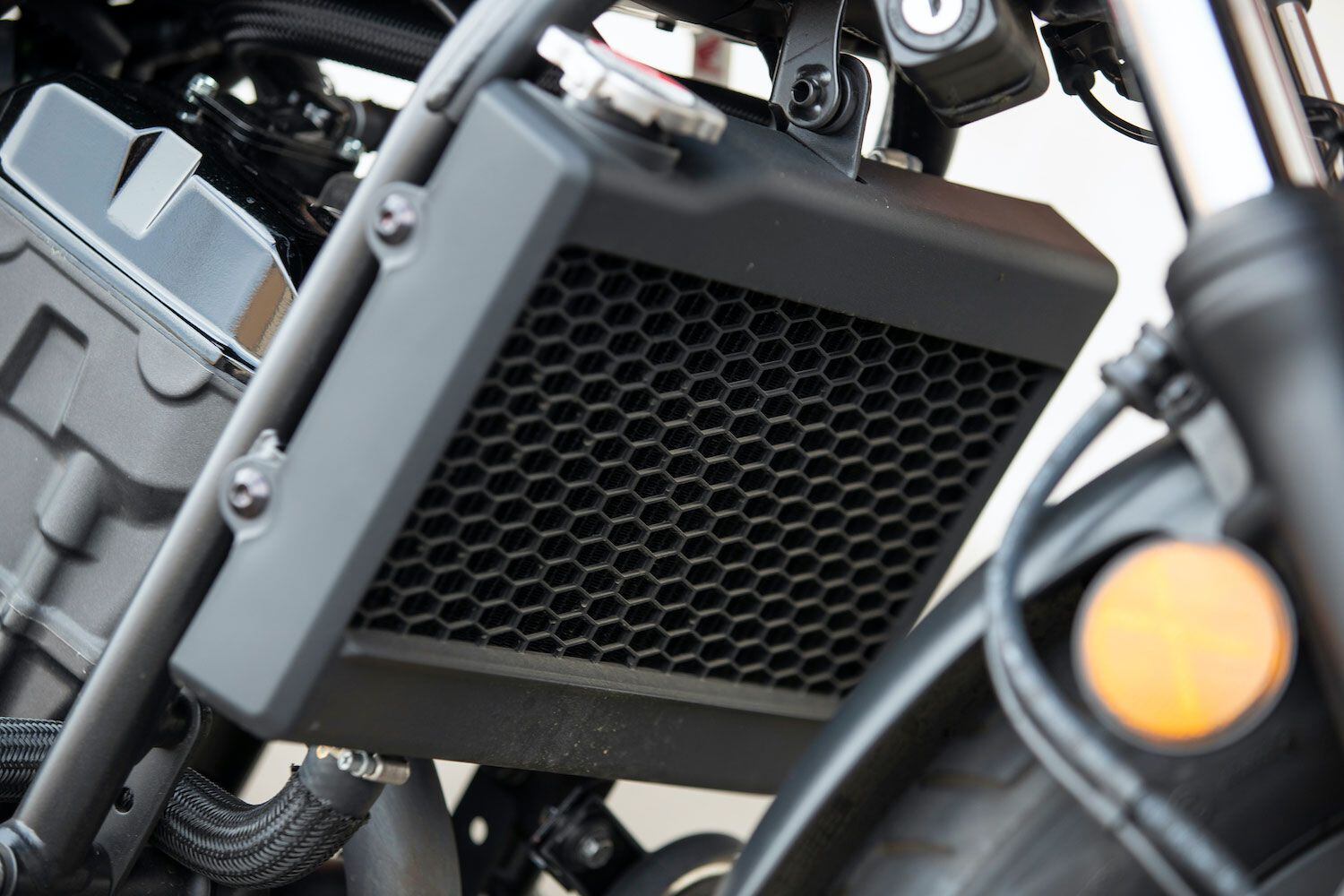 A close-up of the radiator gives you a glimpse of the plumbing required to cool the Rebel engine.