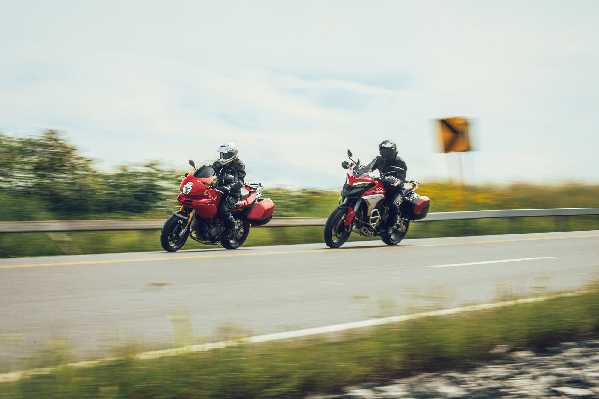 Note the difference in handlebar positions.