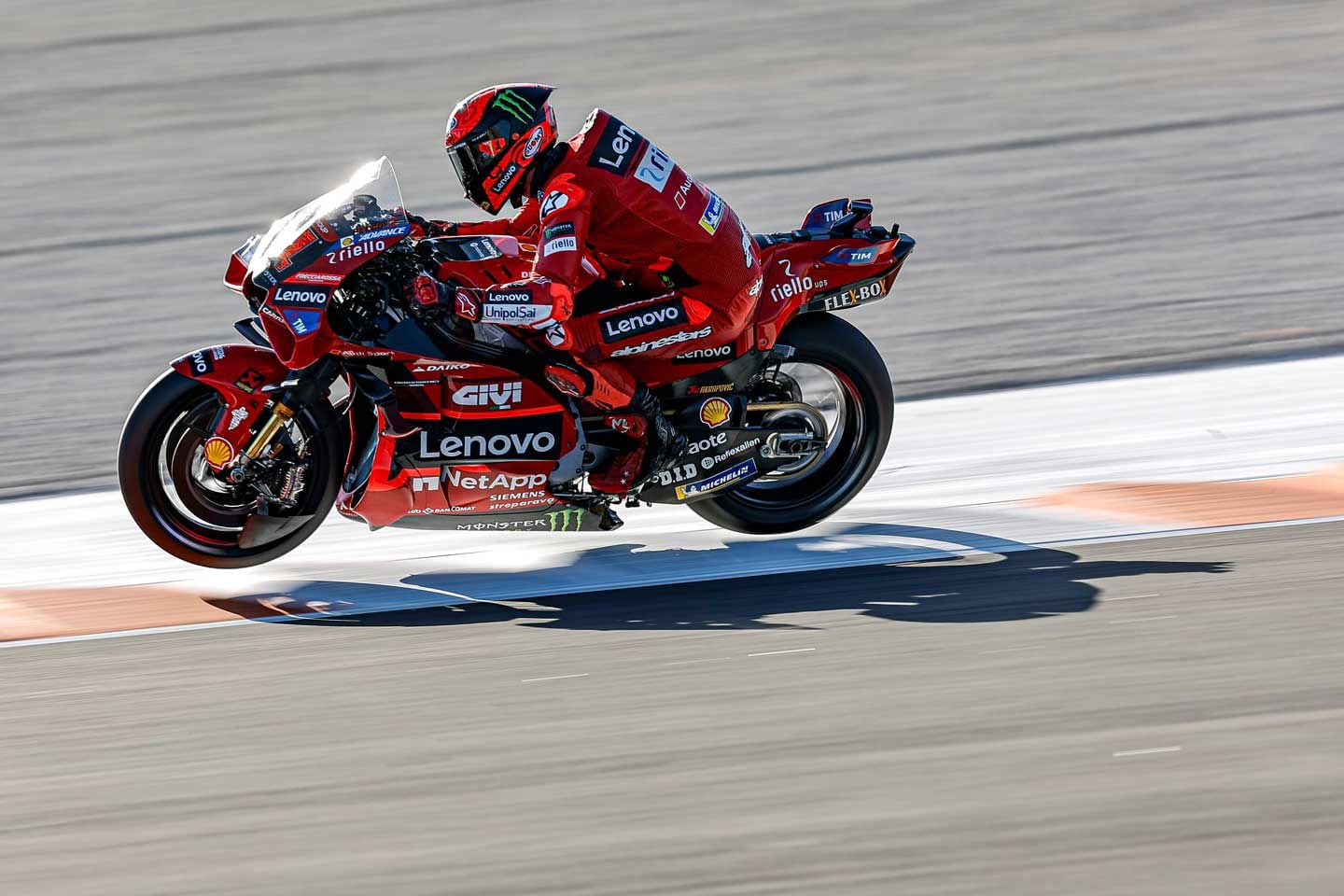 Rear squat allows the rider to accelerate harder by lowering the CG. Wheel lift limit is increased as the rear squats.