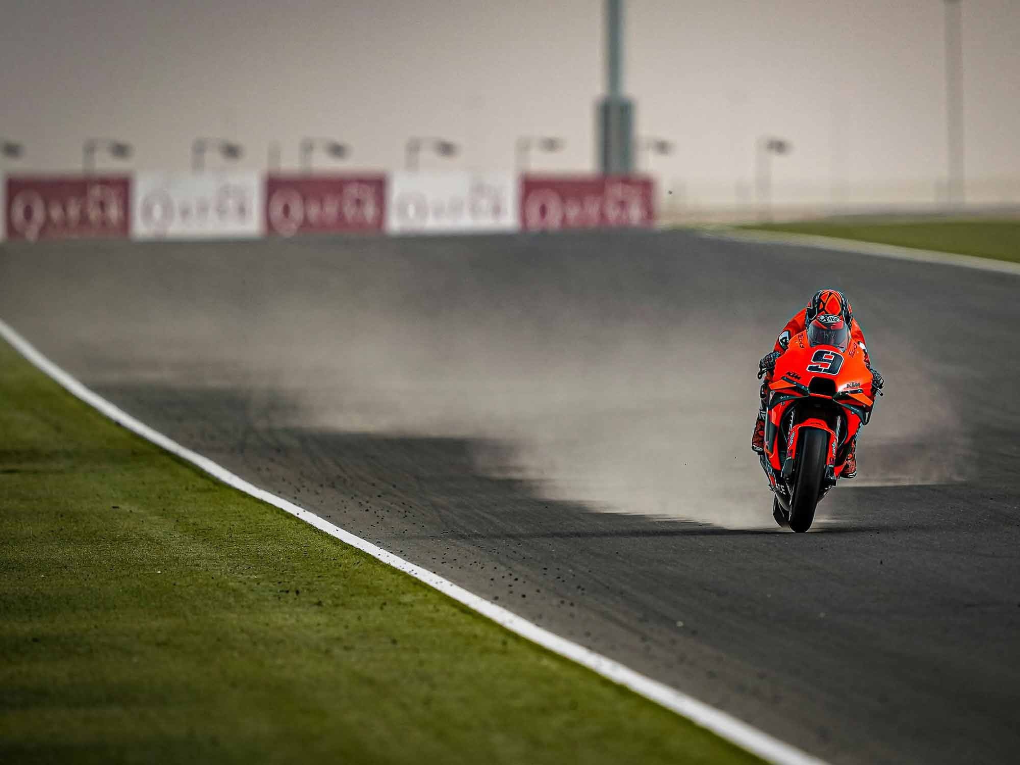 Sand deposited on Losail’s asphalt shows the turbulence left in the wake of a modern MotoGP racebike.