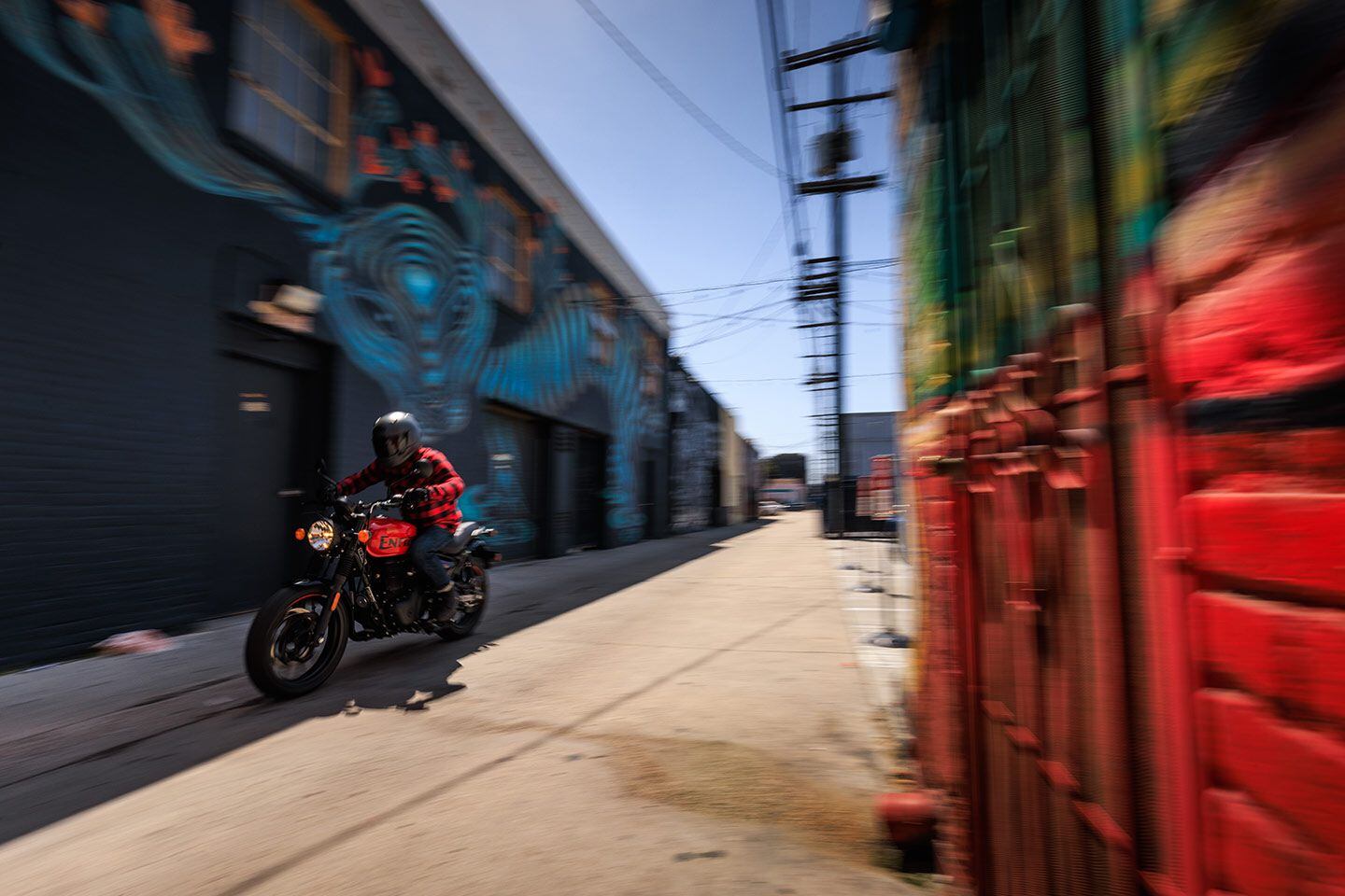 Shortcutting traffic through the back alleys of downtown San Diego.