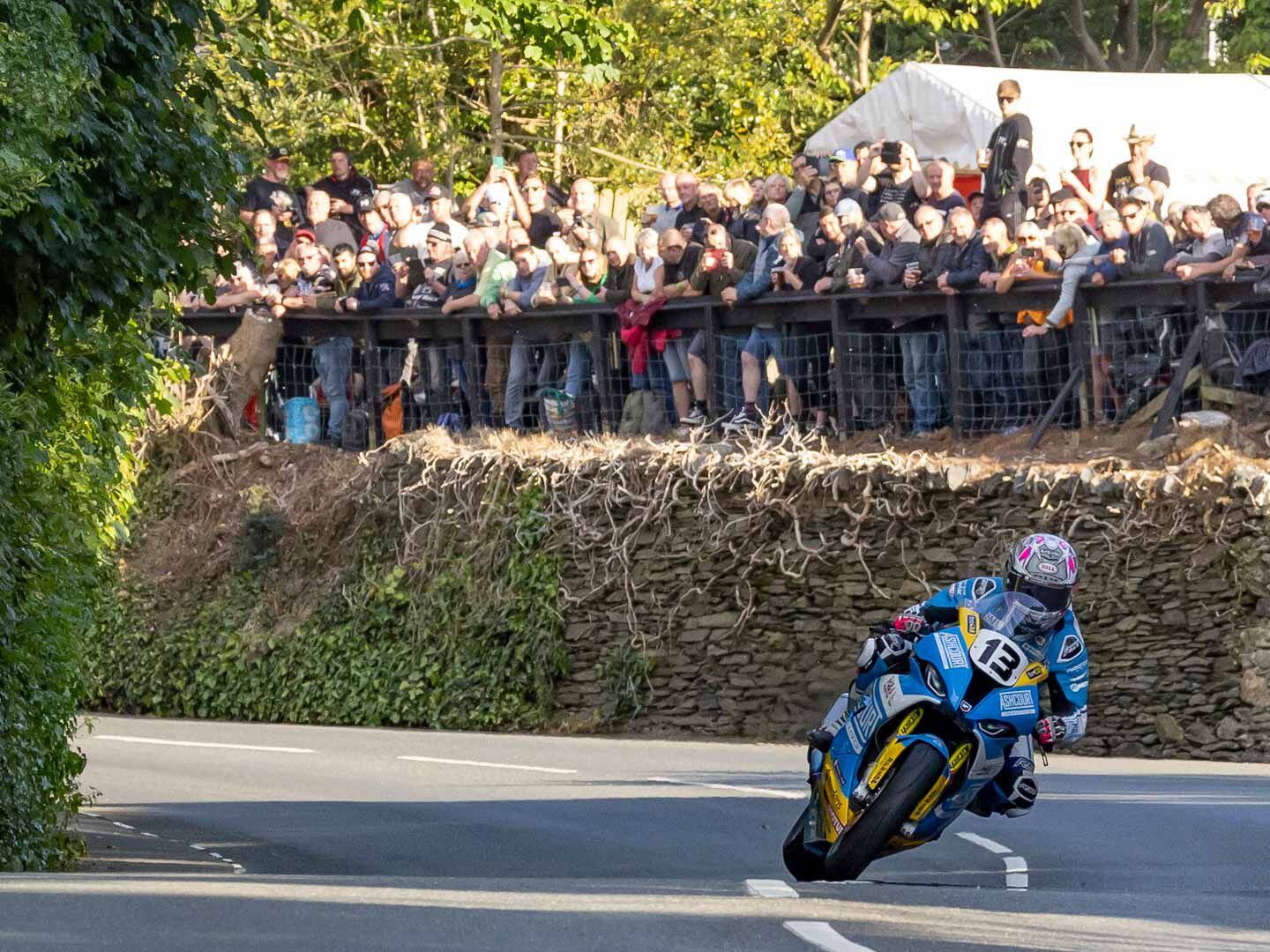 The patio at the Railway Inn at Union Mills gives you an elevated view of riders approaching a sweeping right and transitioning into a quick left for one of the most expansive early views of the course.