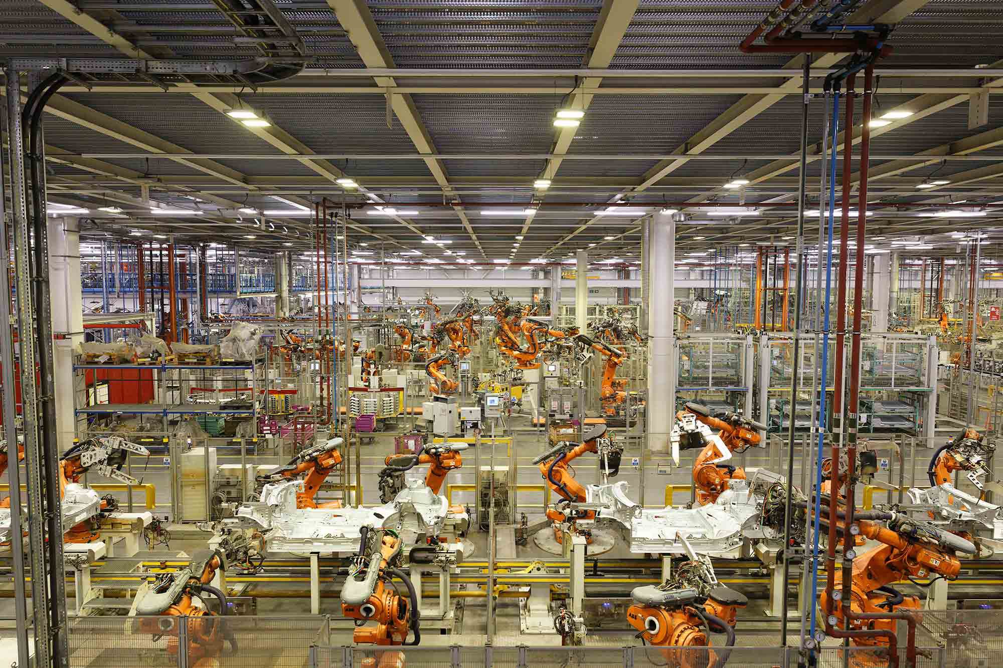 Our future robot overlords practicing for world domination? No, just a modern automated car factory in the heart of England, cranking out a Mini every 67 seconds, three shifts a day, five days a week.