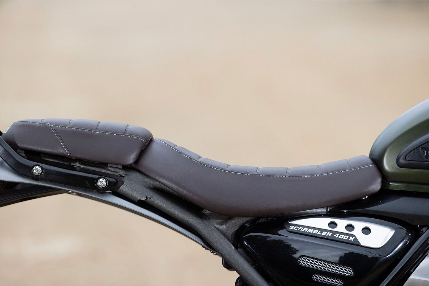 The Scrambler 400 X’s 32.9-inch seat height is almost 2 inches higher than the Speed 400.