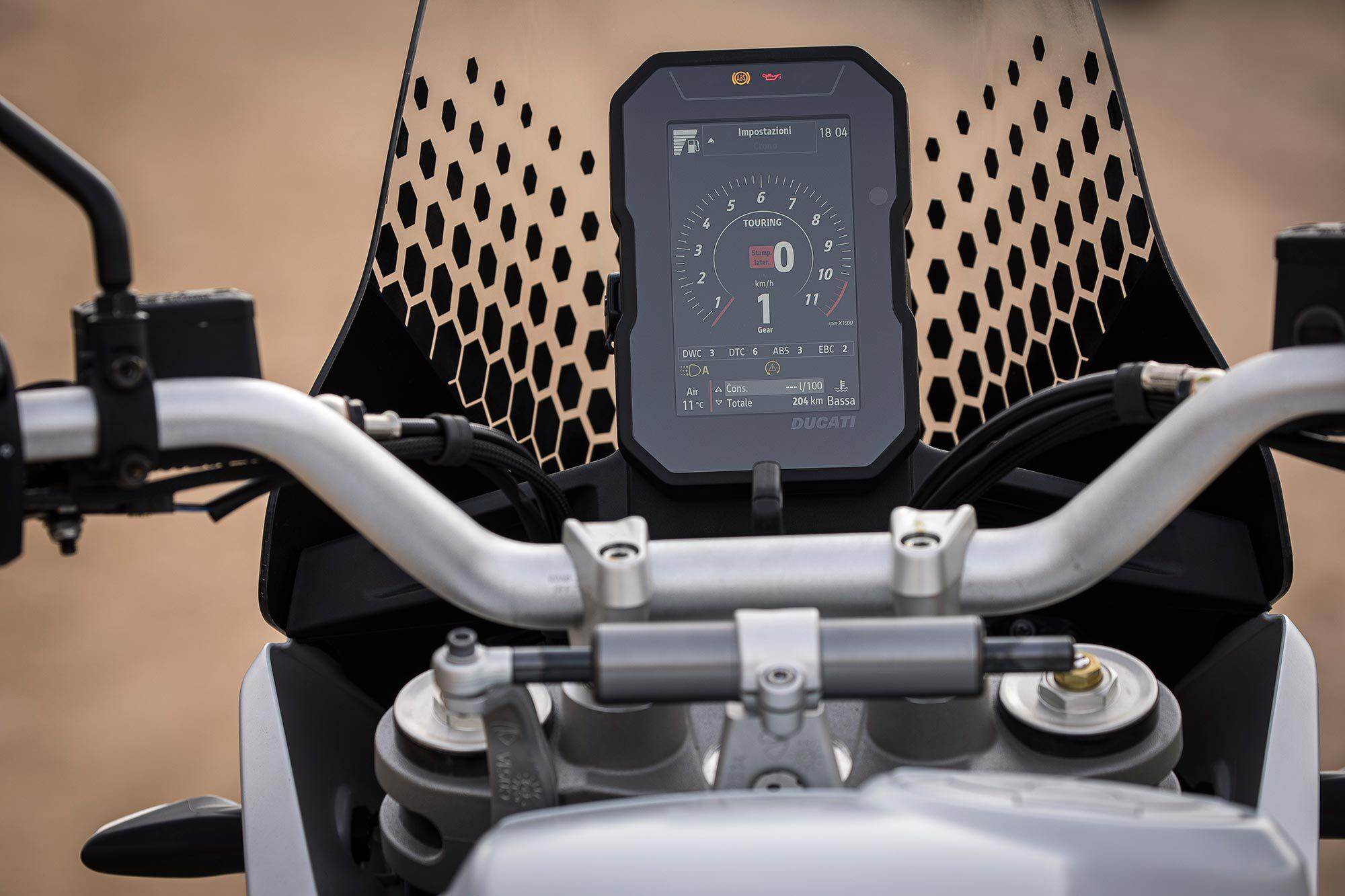 A vertically arranged TFT dash includes accessory turn-by-turn navigation and a rally tripmeter along with the usual and pertinent info.