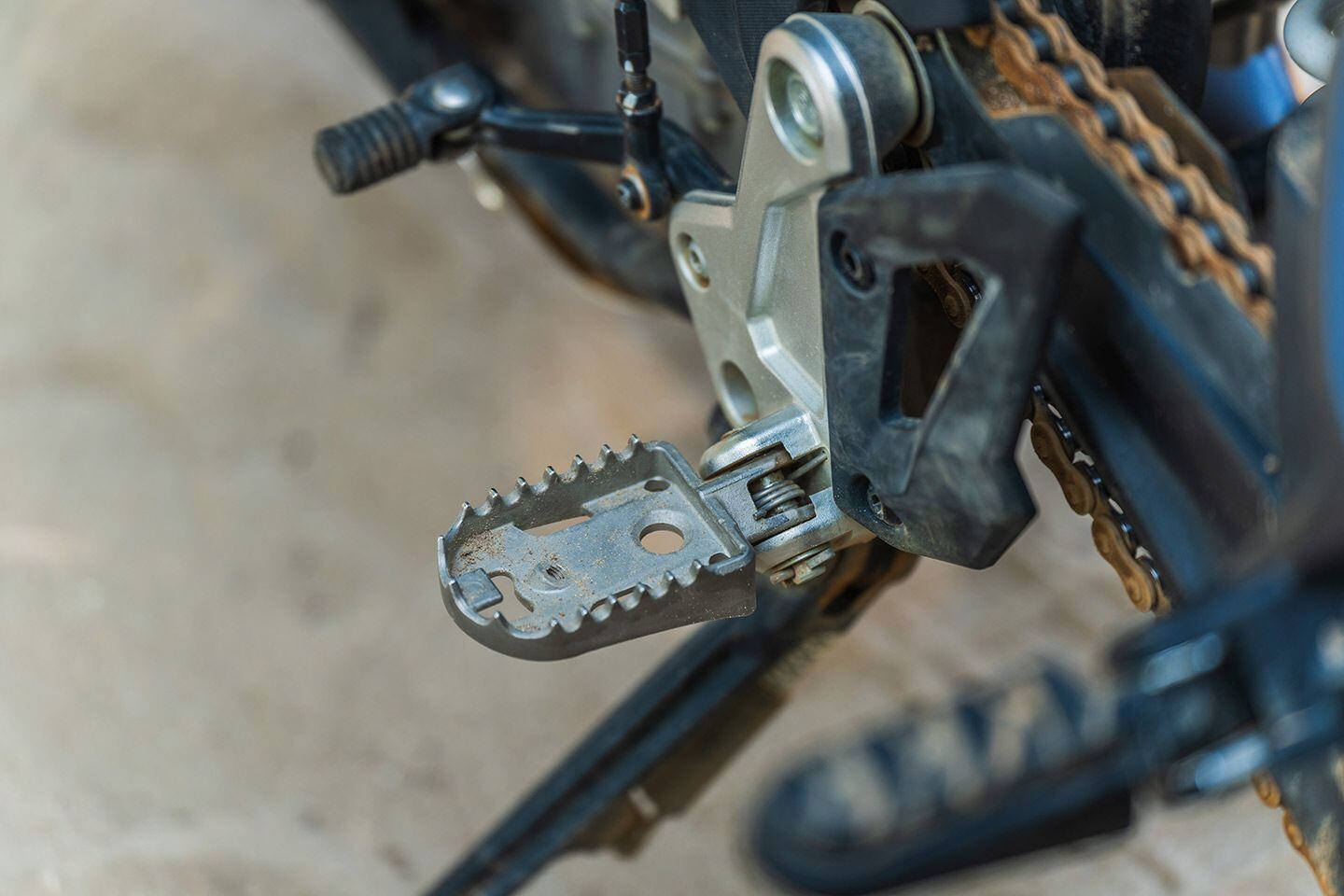 Rubber footpeg inserts are easily removed, revealing studded footpegs that are plenty aggressive for some spirited off-road riding.