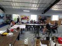 meeting at inde motorsports ranch garage with riders