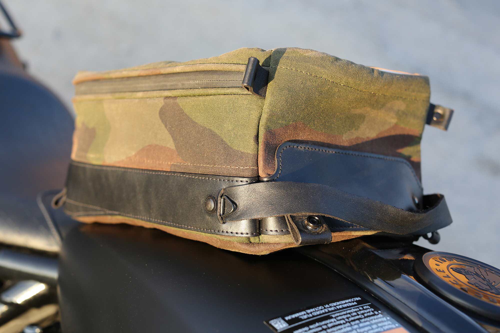A strap on front of the Wheelborne Touring Bag makes it easy to carry off of the bike.