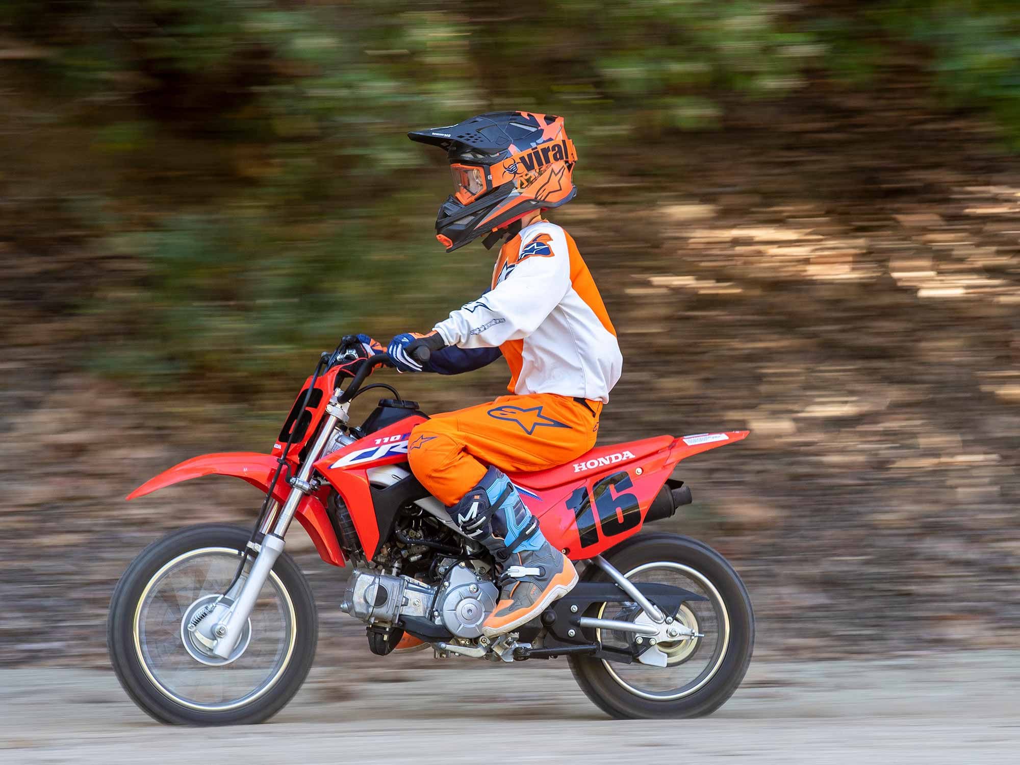 Four-foot-10 Ian Hoyer on a 2022 Honda CRF110F for size comparison.
