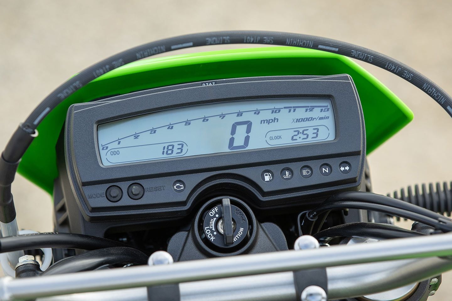 Kawasaki's KLX300 and KLX300SM retain their simplistic digital dash for 2024. Both models would benefit from a proper fuel gauge and gear position indicator, like the unit found on the Honda CRF300L.