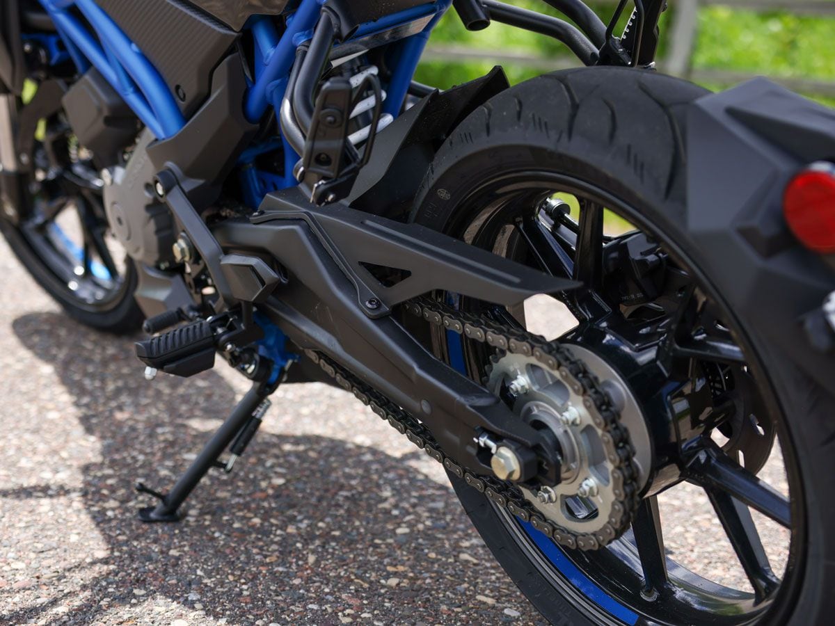 The 300NK's swingarm blends well with the trellis frame chassis.