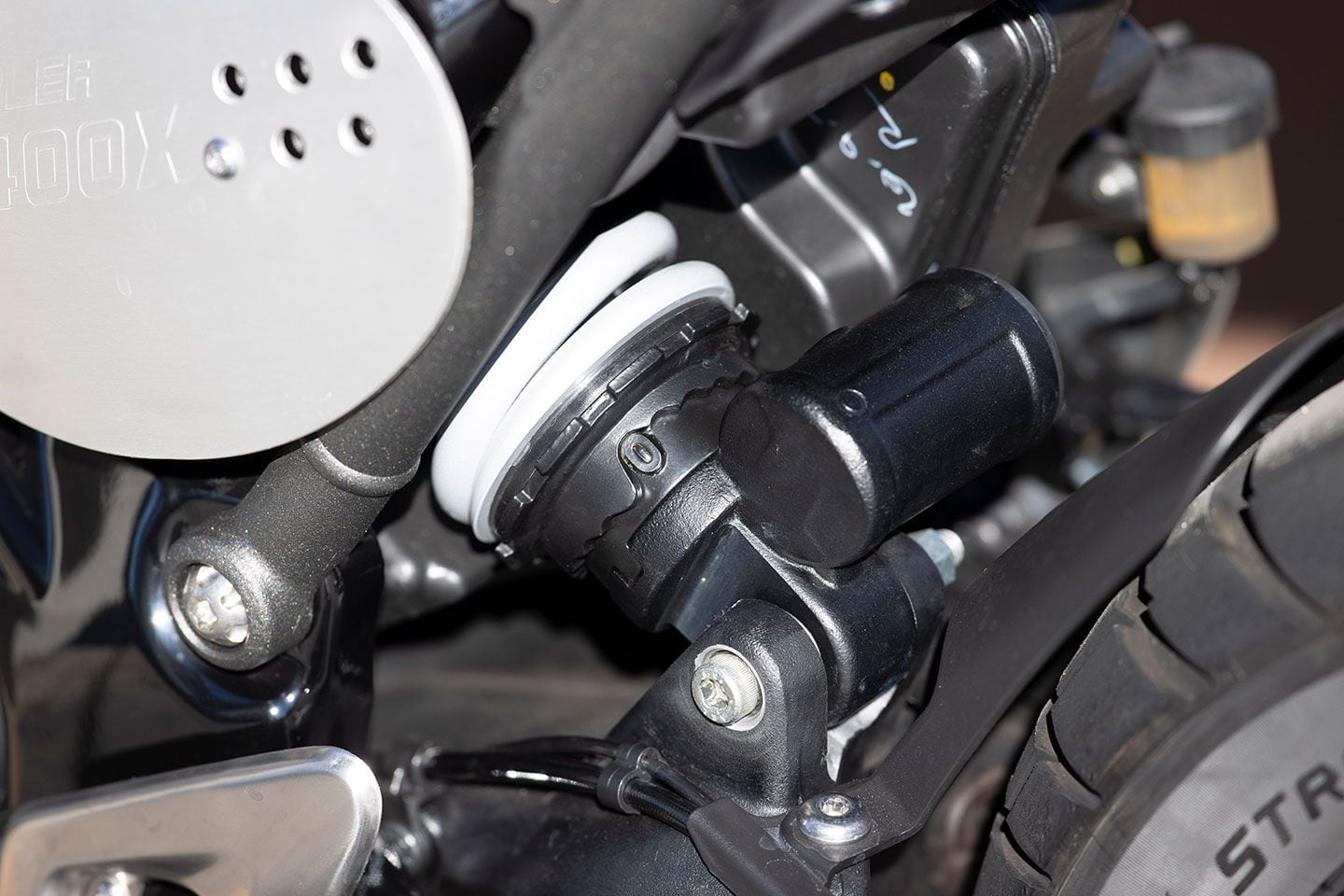 A stepped preload collar is the only suspension adjustment available on the Speed 400 and Scrambler 400 X.