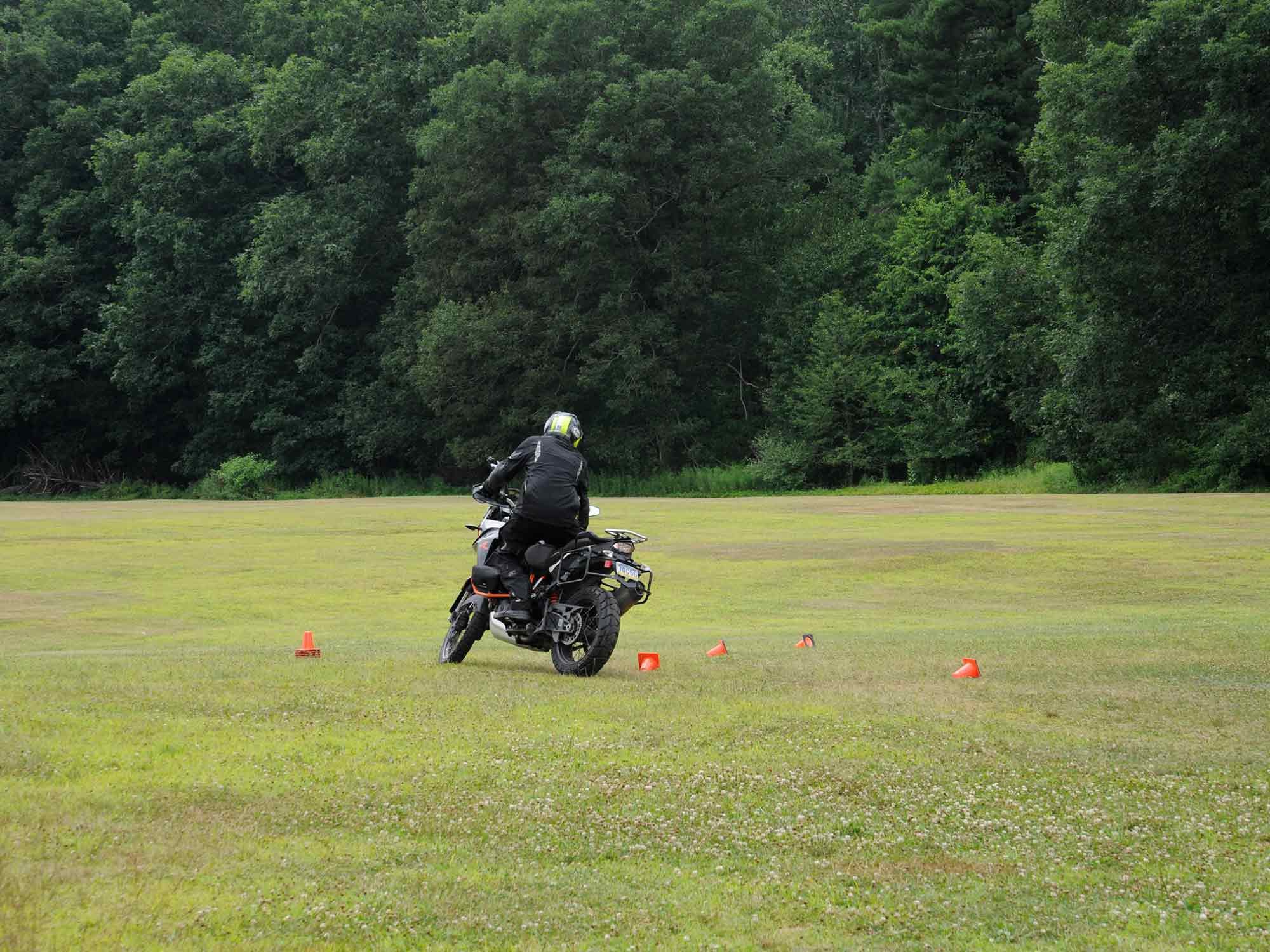 Look where you want to go and counterbalance that motorcycle.