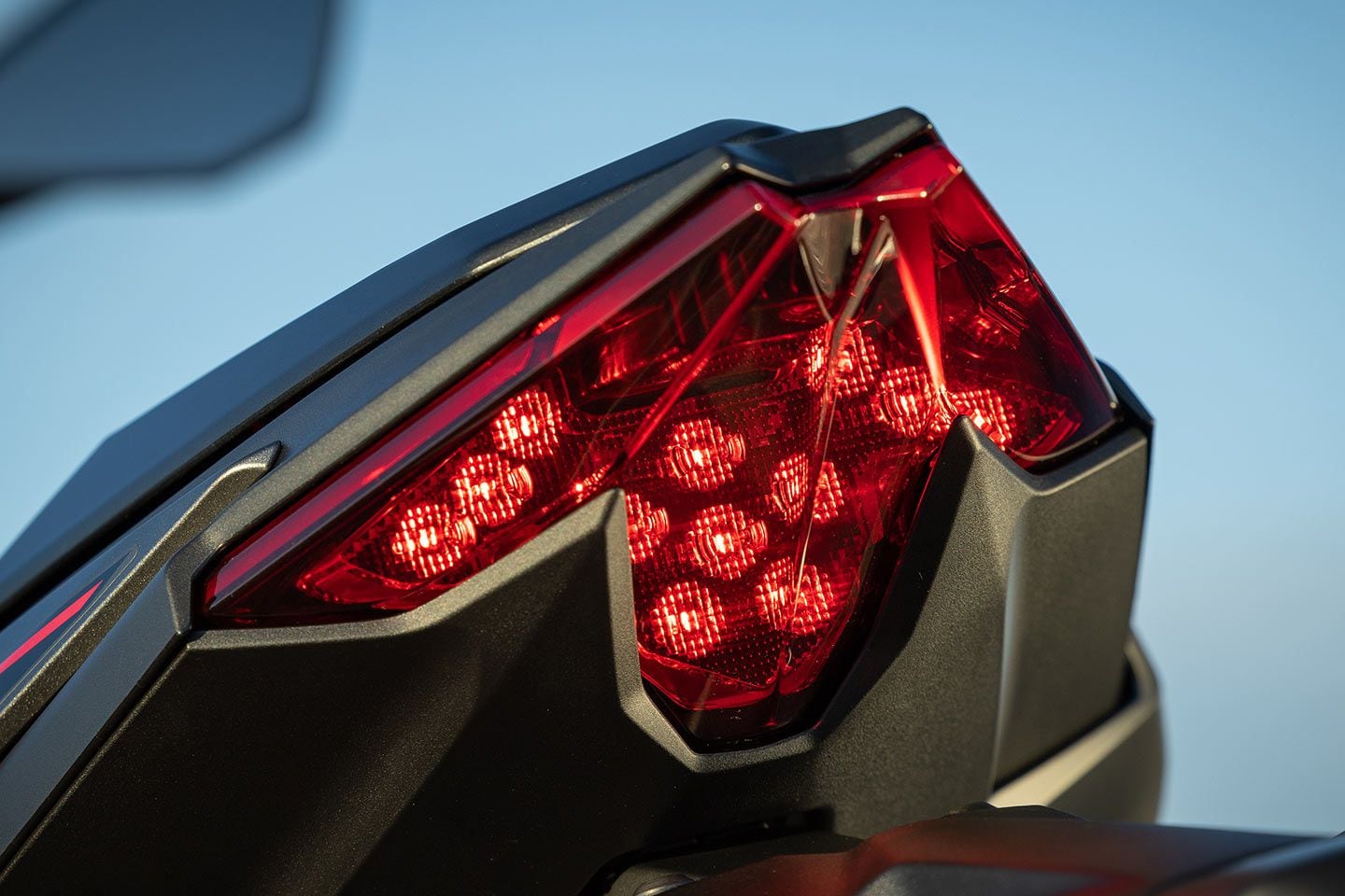 Both models feature an LED headlight and taillight. The SE model comes standard with LED turn signals. Base model owners can upgrade to LED indicators through the Kawasaki Genuine Accessories catalog.