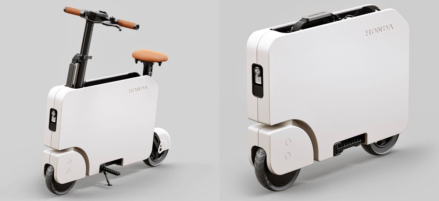 A closer look at the Motocompacto in folded and unfolded form. Notice the strap on the handlebar post, which is how you carry around the 41-pound scooter. Notice also how the rear wheel slides into the body to keep the scooter as compact as possible when folded.