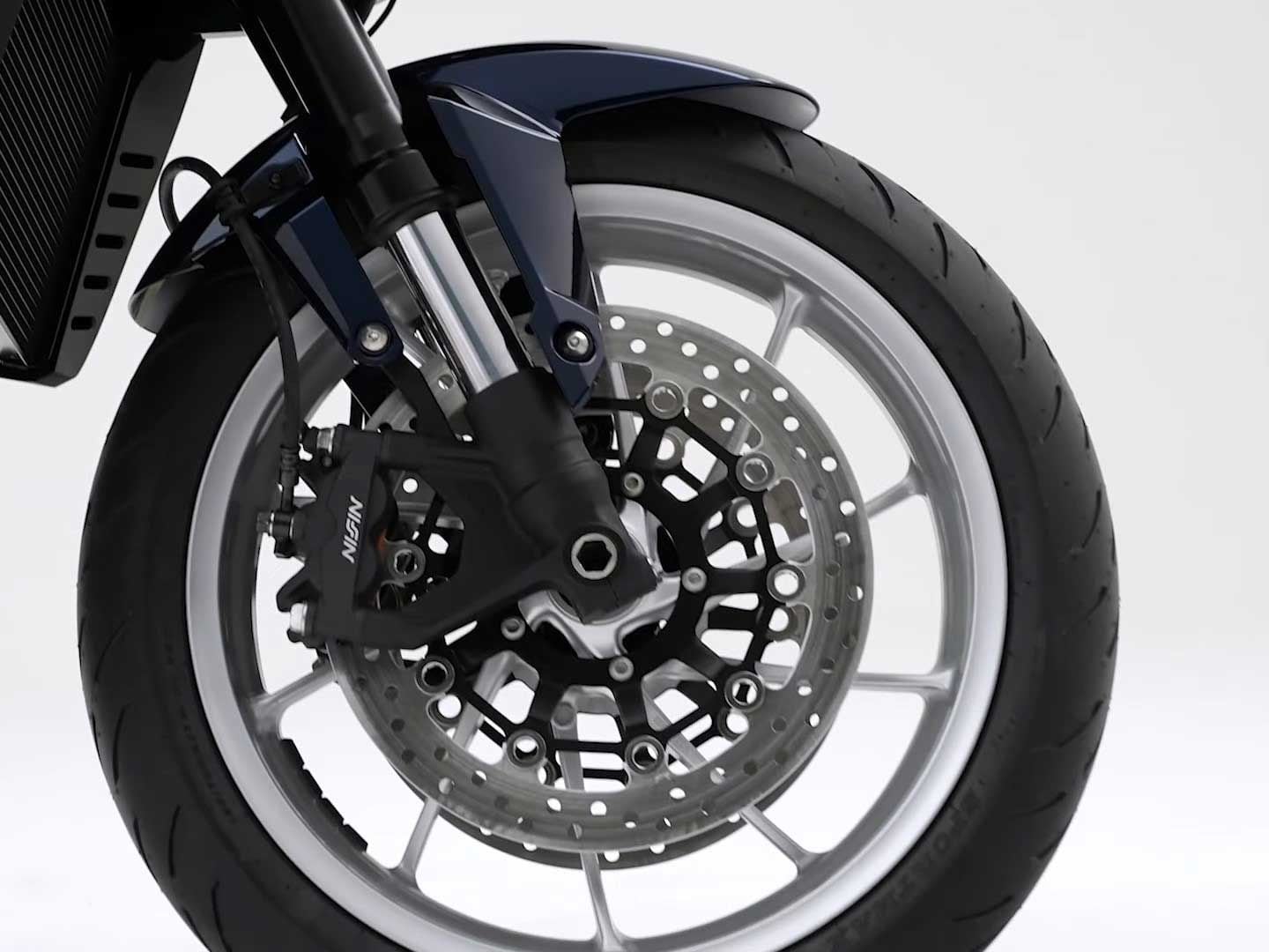 The 17-inch alloy wheels carry over from the NT1100, though the Hawk gets a different Showa SFF-BP fork.