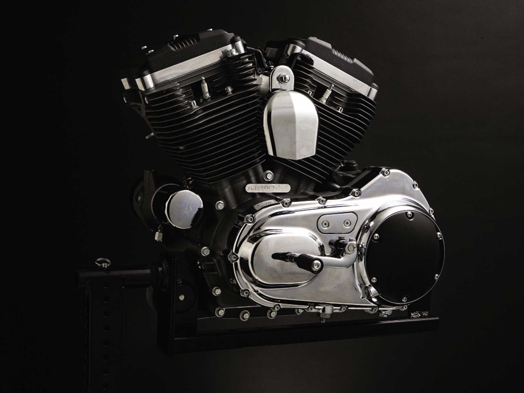 This OHV 1200 Sportster engine traces its four-cam valve train to 1929 and its compactness to the unit construction of the postwar side-valve K-model. Along the way, Harley’s hugely successful XR-750 dirt-track racing engine was developed from the Sportster in 1970. Note the layer-cake design of its block heads.