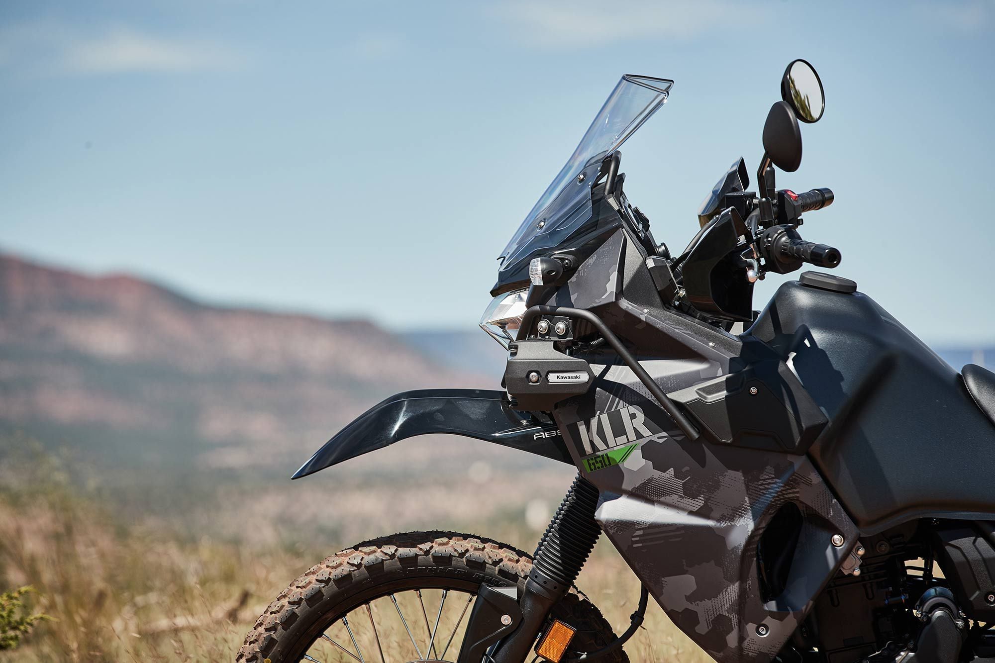 The KLR’s new windscreen and fairing keeps wind buffeting to a minimum.