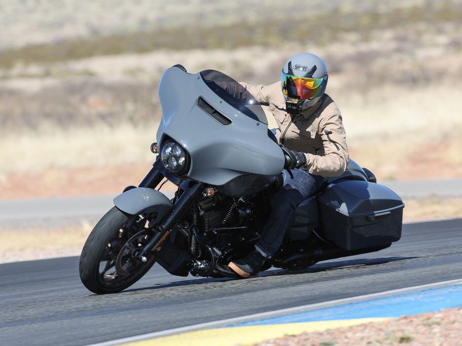 Low floorboards scrape at the same angle as other Road and Street Glide models, reminding the rider of the bike’s still-inherent limitations.