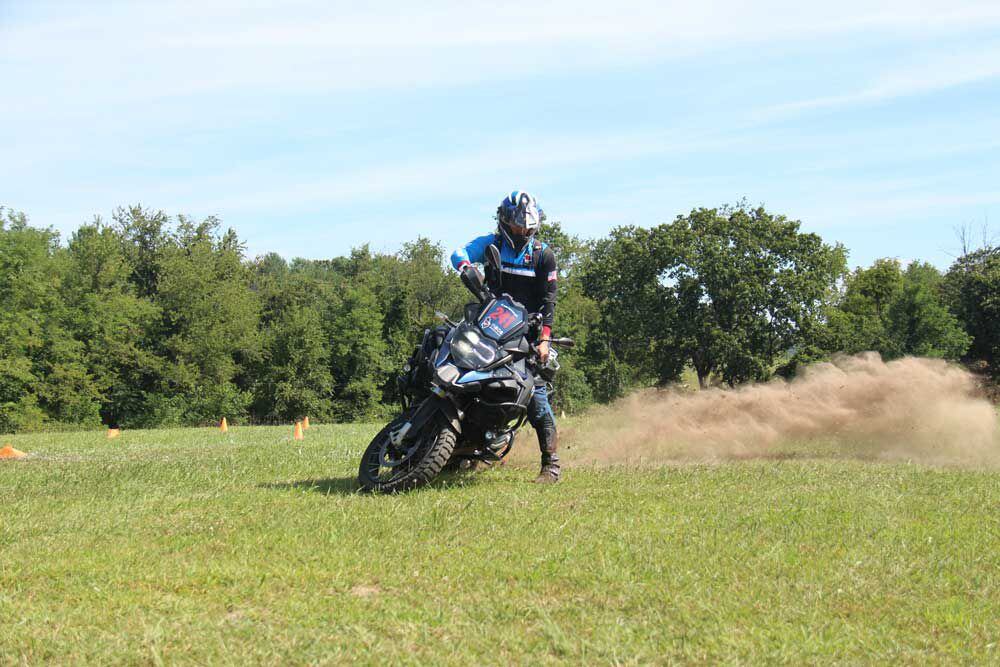 Ben Phaup, 2022 BMW International GS finalist and owner of 241 Moto, demonstrates an elephant turn.