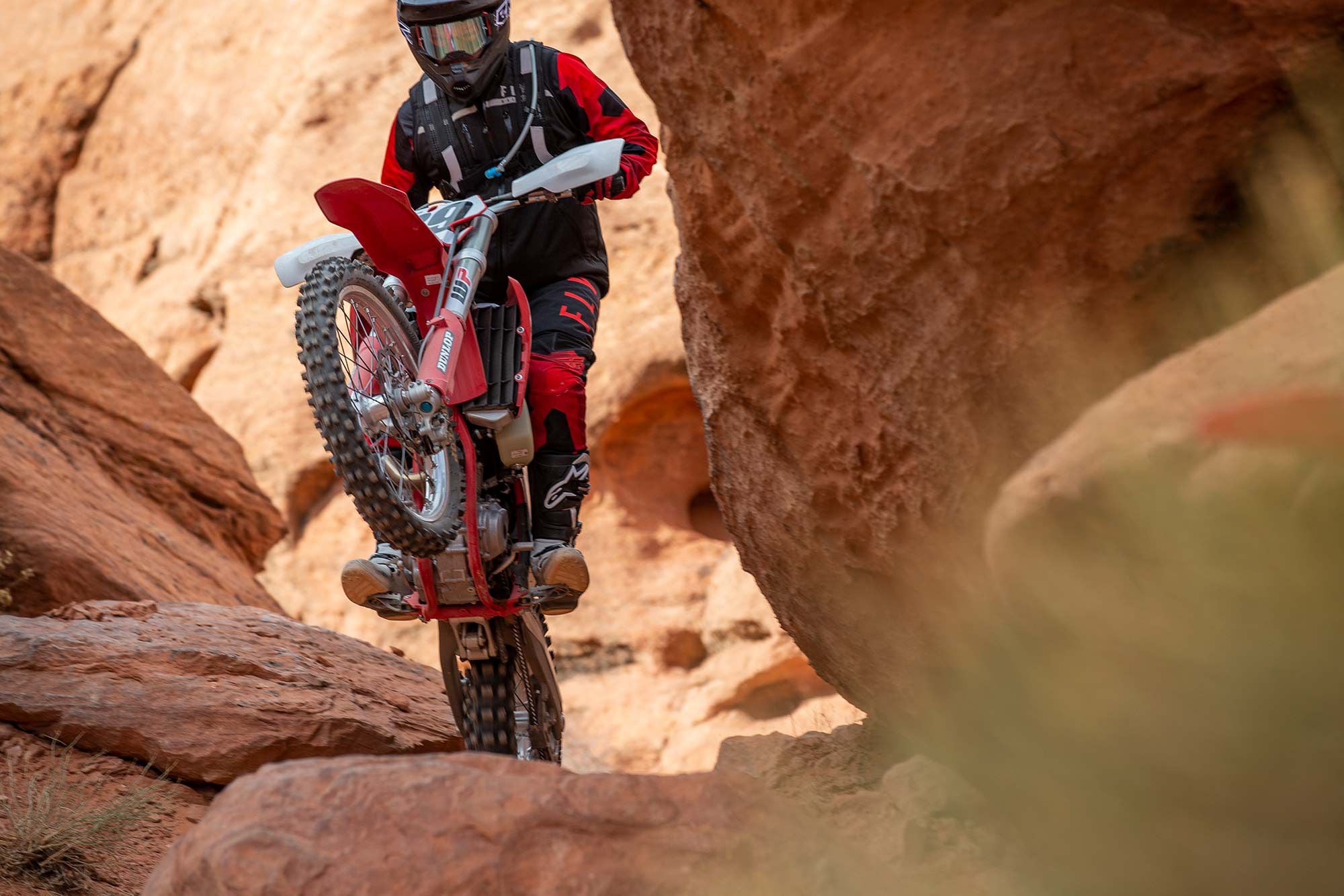 The EX 350F is the lightest of the three bikes and feels like it on the trail.