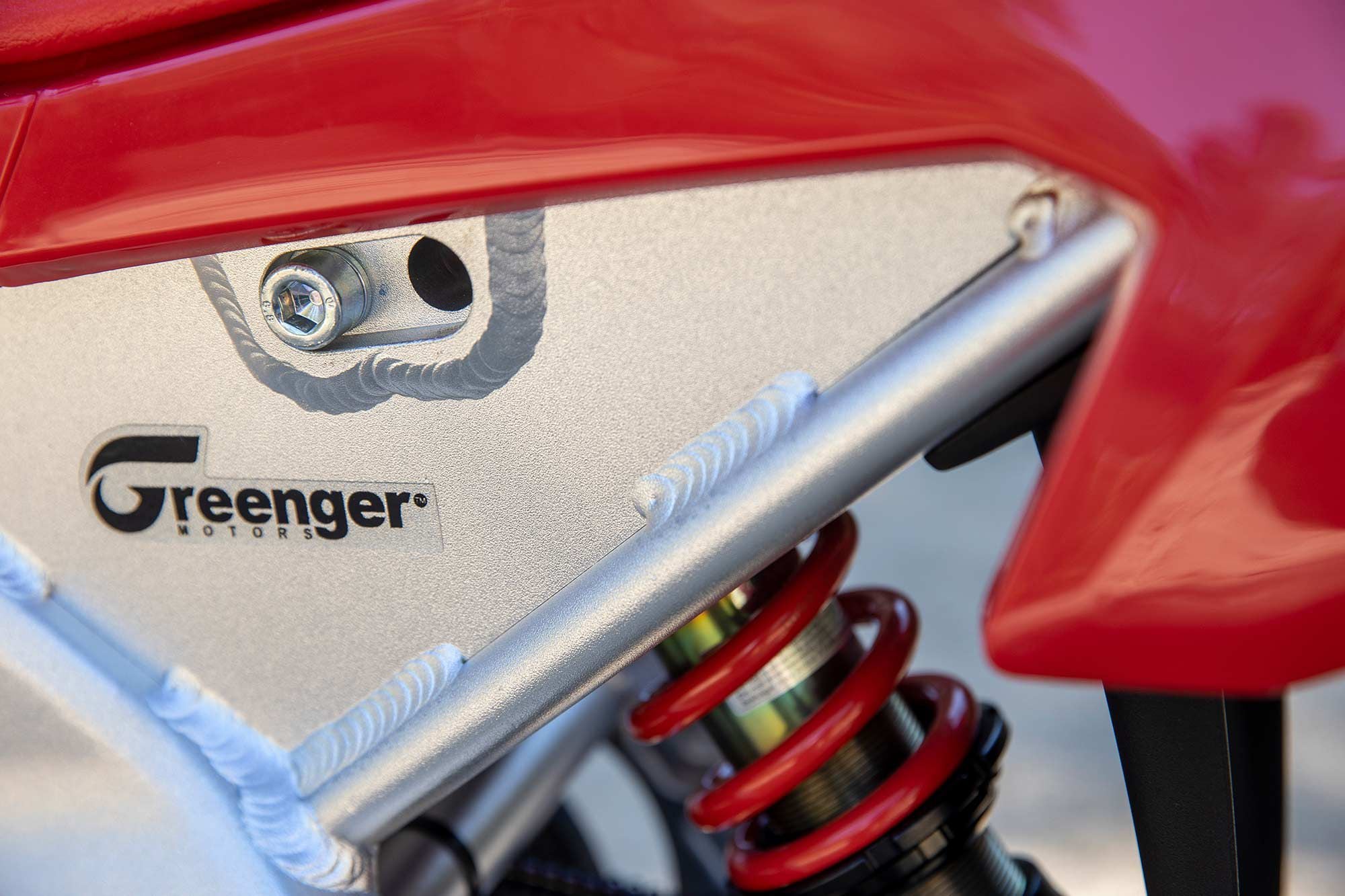 Upper shock mount is two-position adjustable to change seat height 0.7 inch. Remove the single Allen bolt, reposition shock, and reinsert bolt.