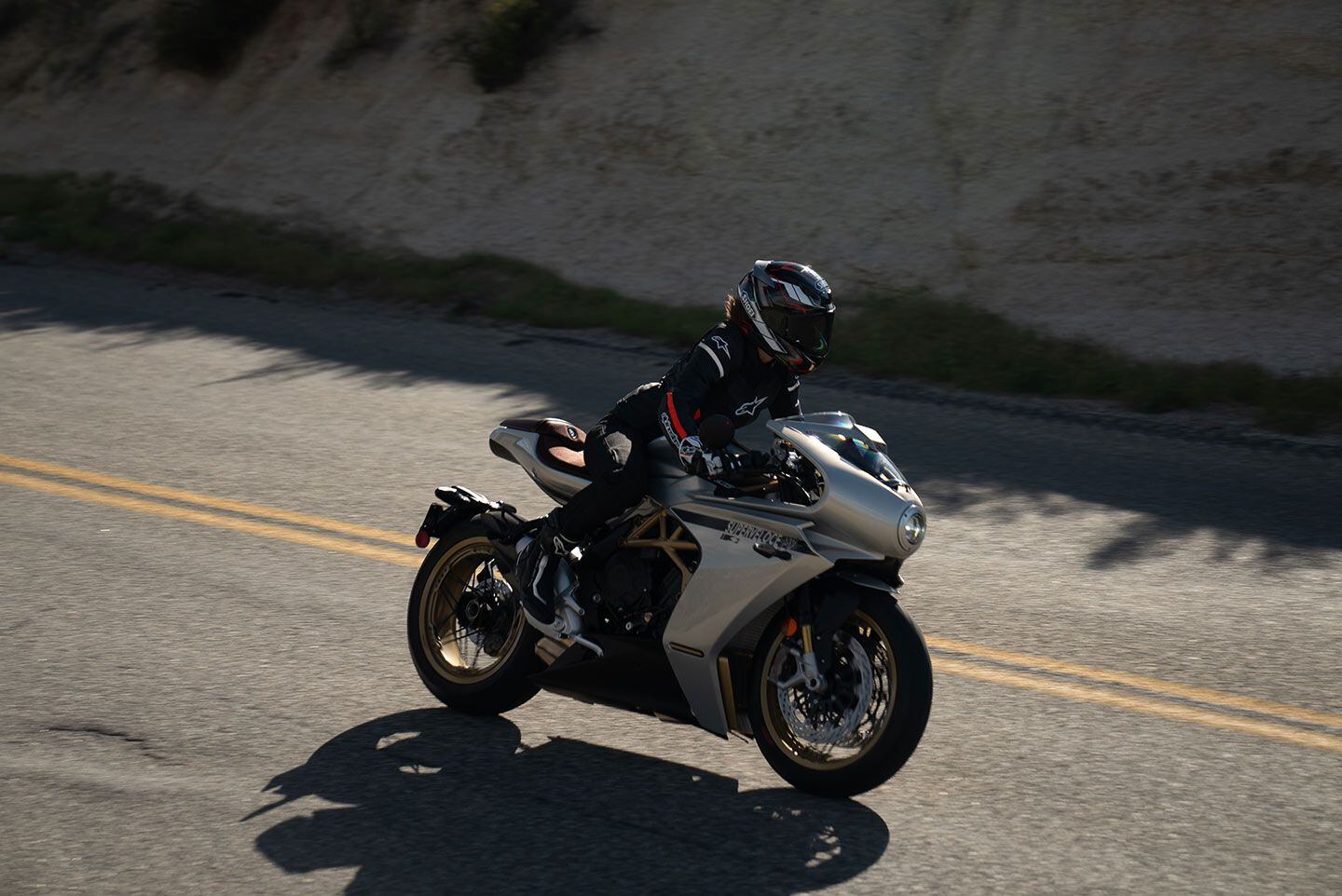 Photographic proof that women also enjoy the Superveloce S fully clothed and geared up.