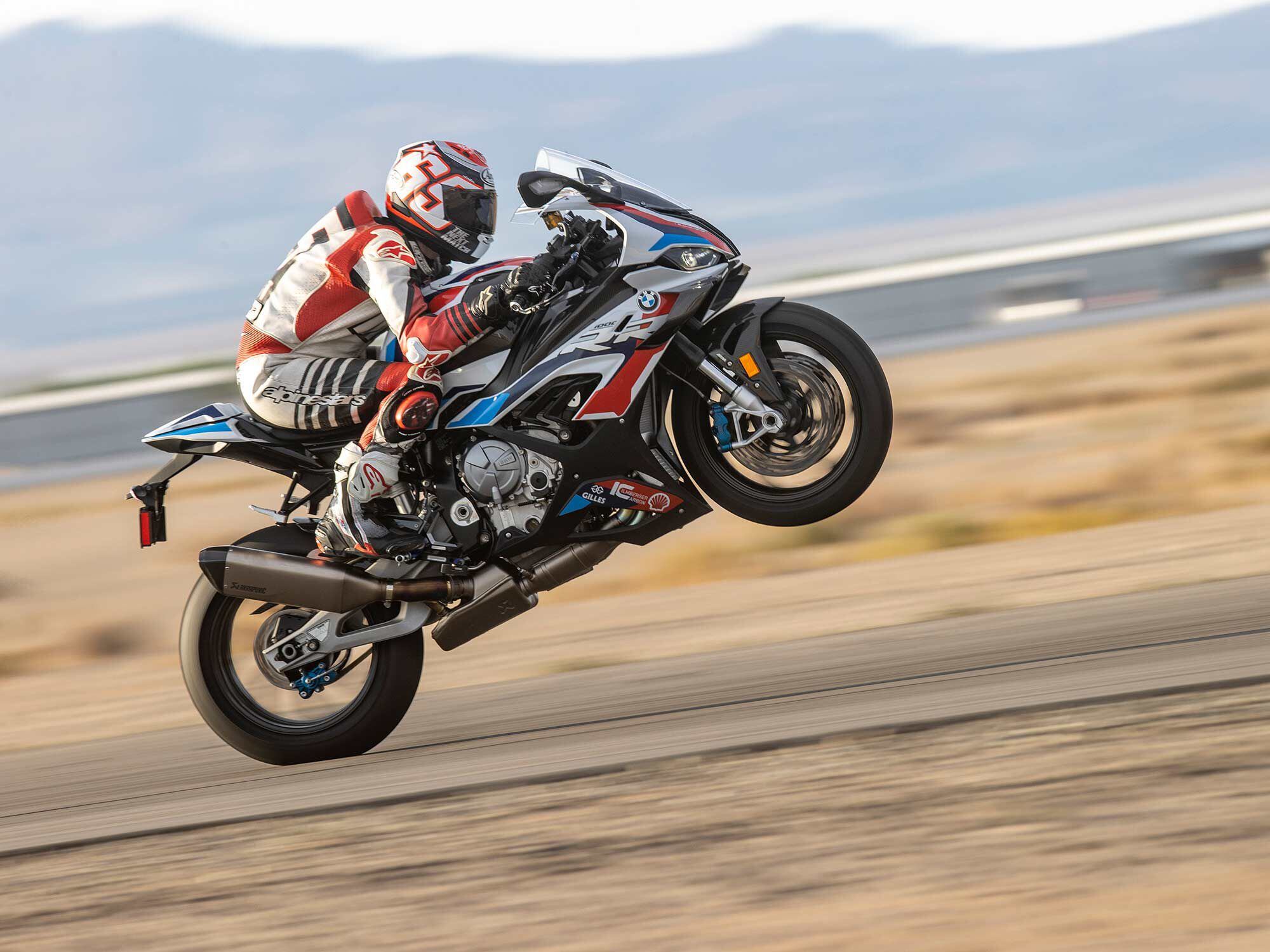 Lofted wheelies showcase the strong midrange torque and excellent chassis balance of the BMW M 1000 RR.