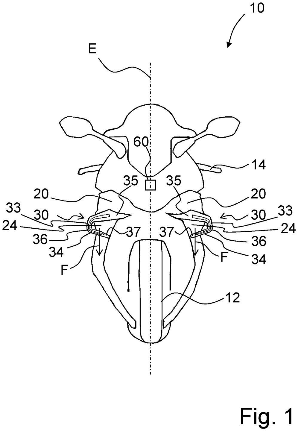 A front view shows the winglets (33) and the LEDs that are inset within them.