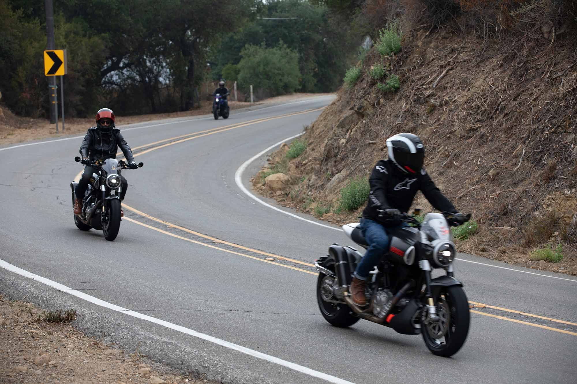 Gard Hollinger leading the group, followed by Senior Editor Morgan Gales, and Keanu Reeves in the rear.