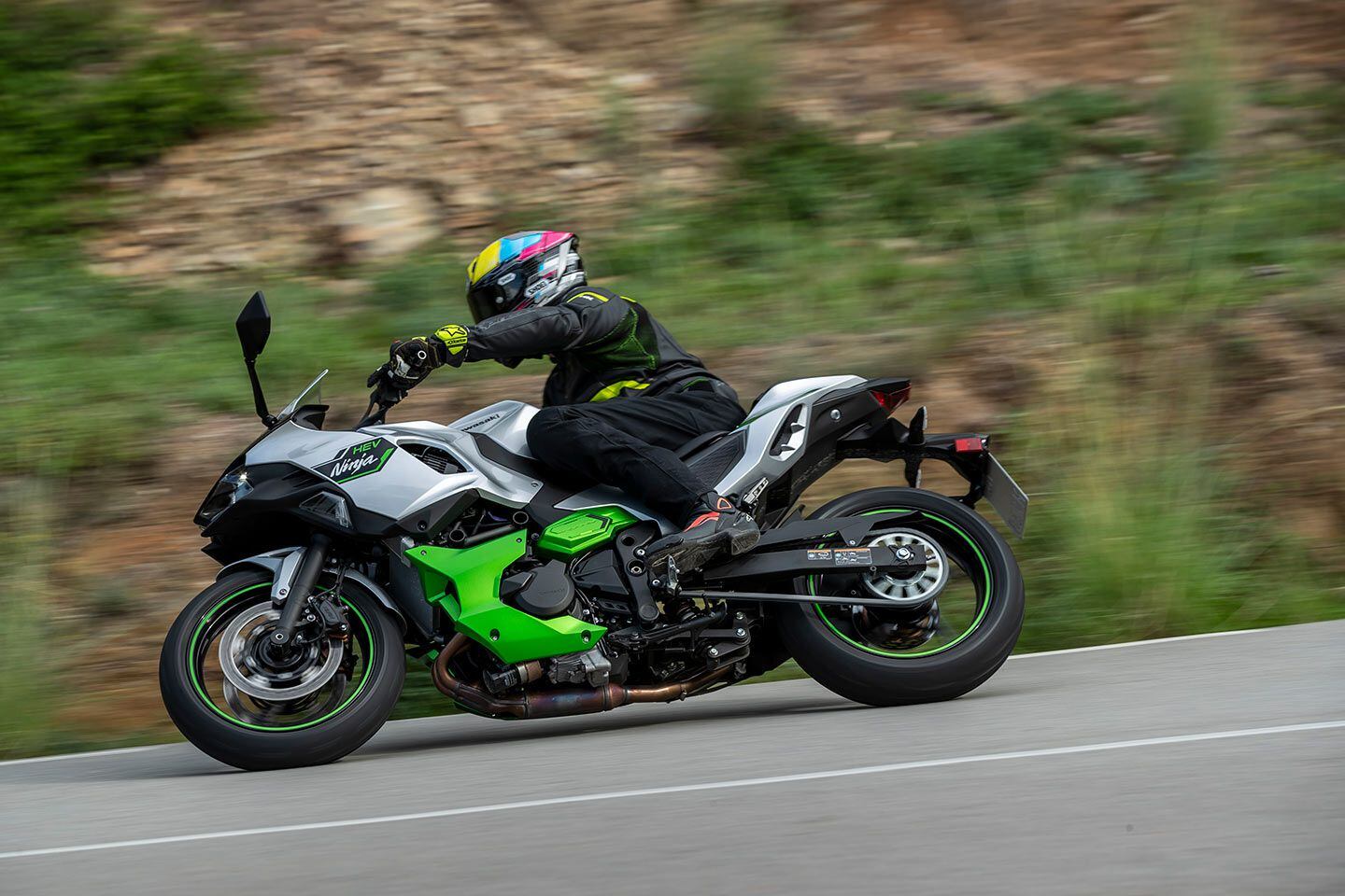 The Ninja 7 Hybrid’s long wheelbase and added weight mean the bike is not as nimble as a Ninja 400, but it still hustles down a tight mountain road.