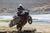 adventure bike with surfboard attached