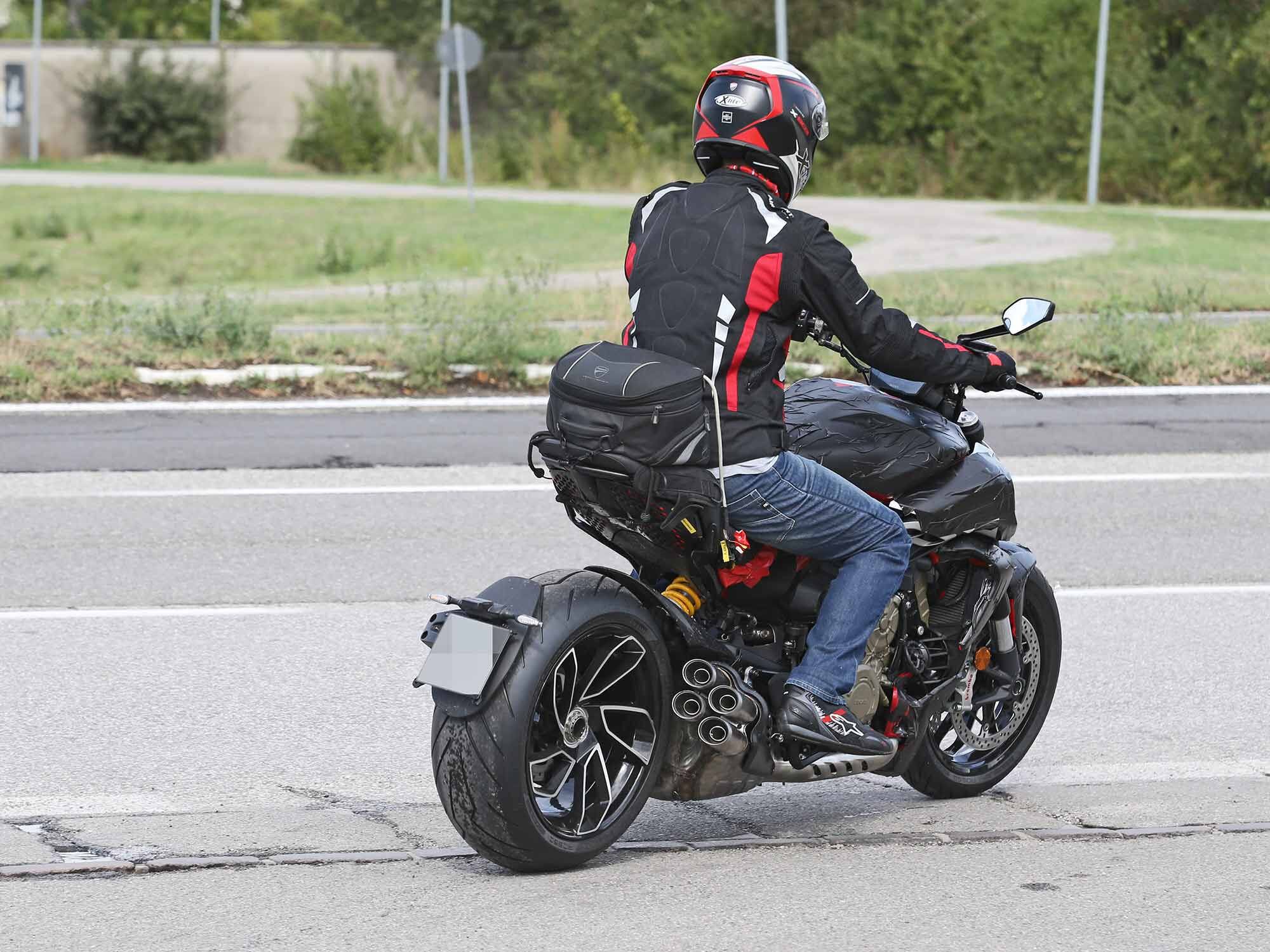 In this shot, you can clearly see the four individual exhaust silencers exiting from the underbelly muffler.