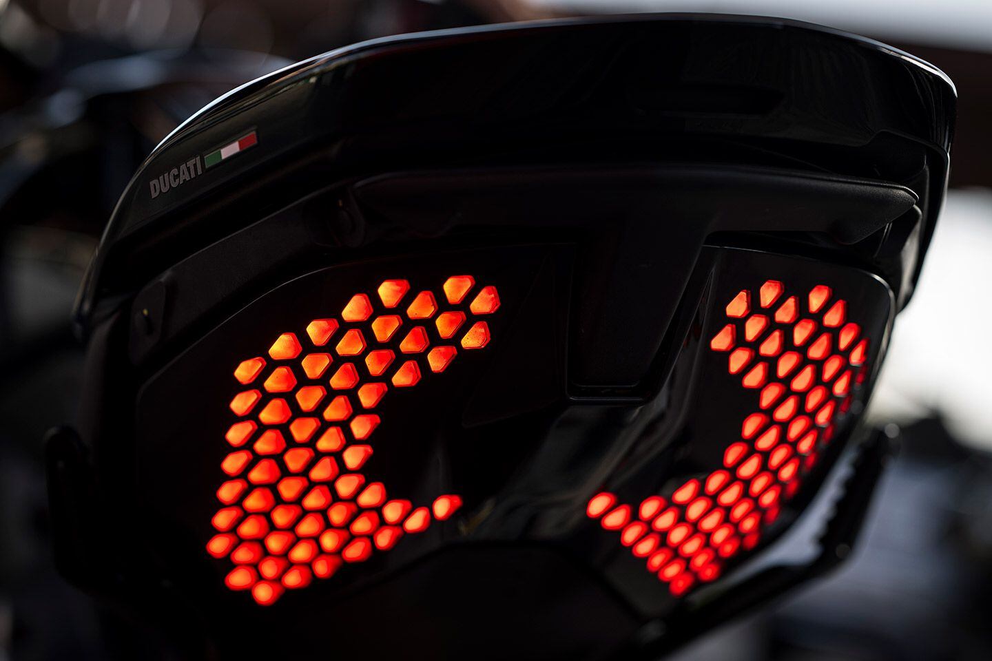 This dynamic LED taillight on the 2023 Ducati Diavel V4 costs more than the LED headlight and looks like it was lifted from the latest Lamborghini.