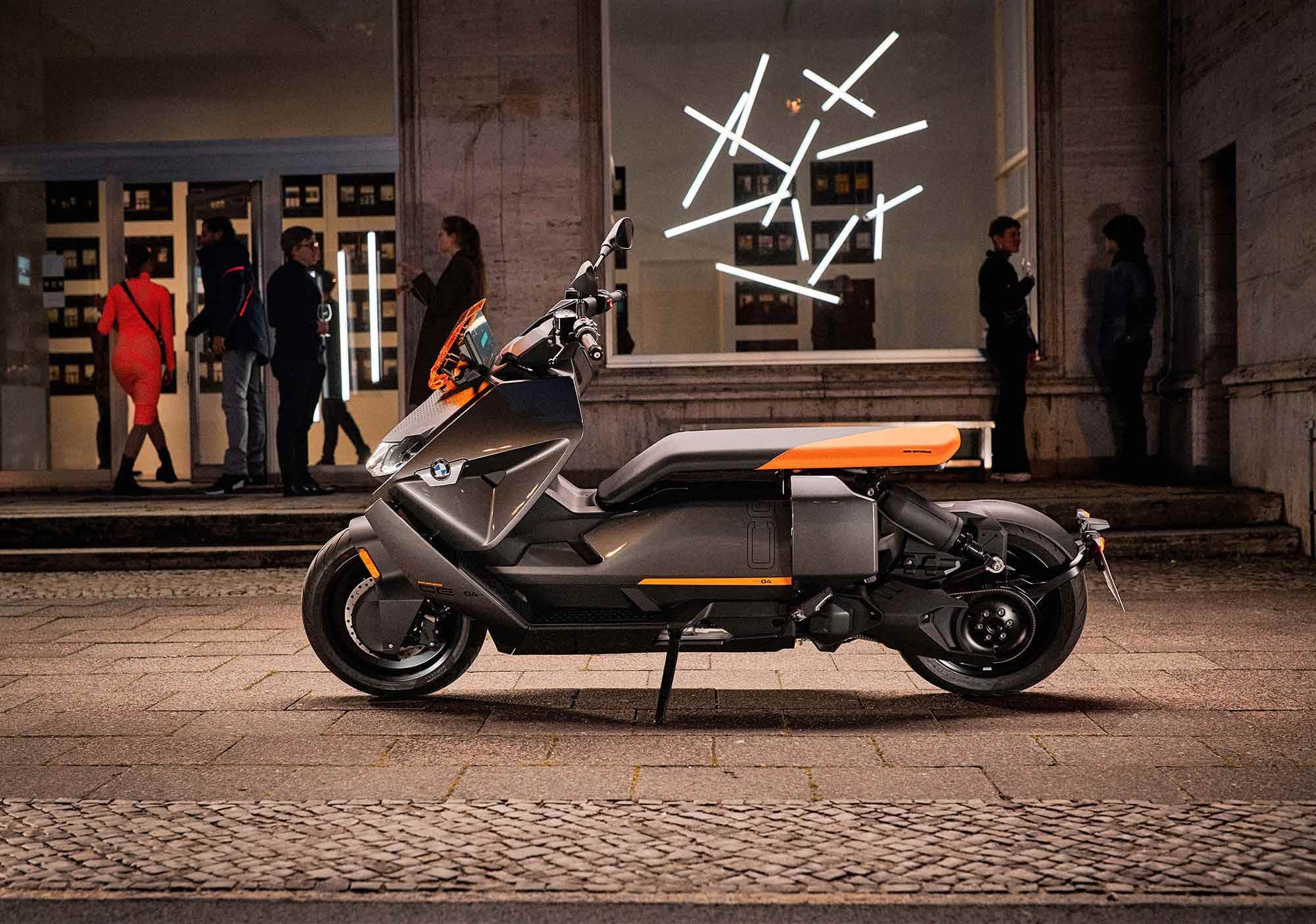Styling carried over from the concept includes a flat seat hovering over a steel tube chassis covered in bodywork, with solid disc wheels.