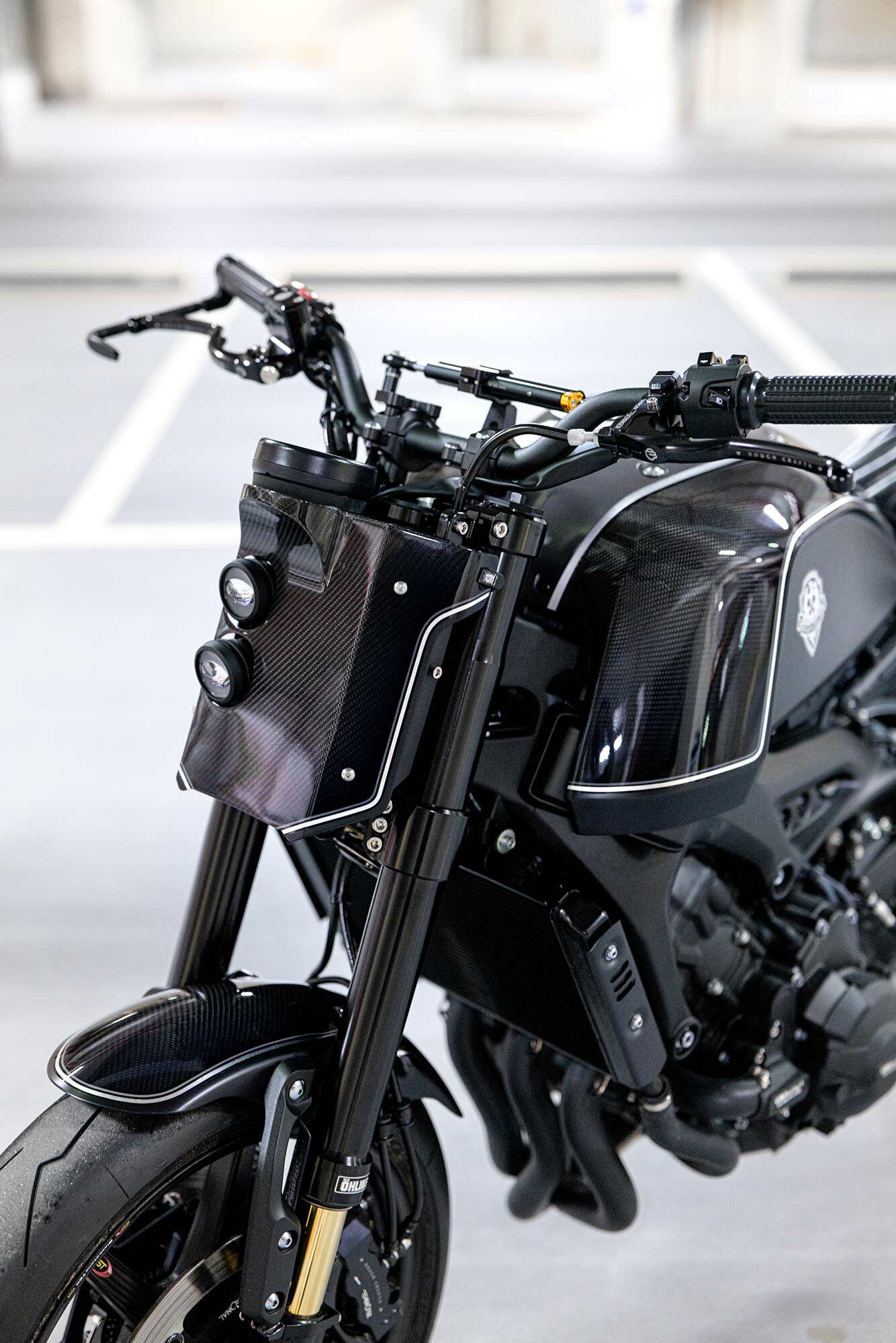 Although not listed on the site just yet, the carbon fiber number plate and headlight should be available shortly.