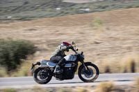 2024 Triumph Scrambler 1200 X riding on mountain road