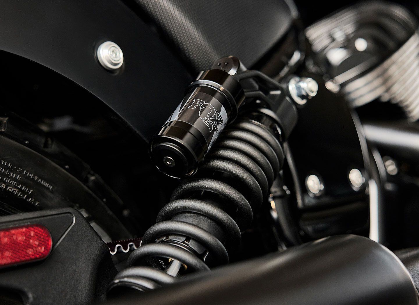 Exposed Fox piggyback shocks offer longer travel and are adjustable for preload on the Sport Chief.