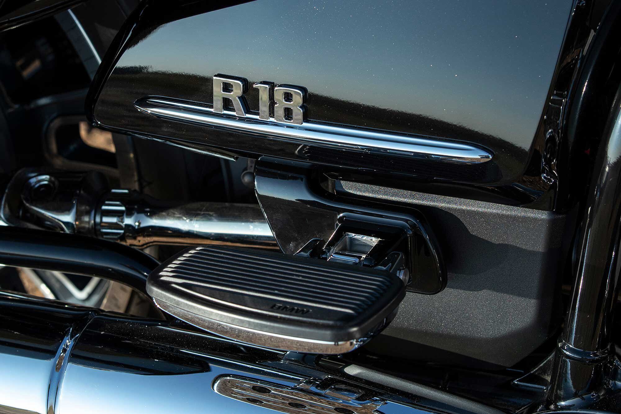 Although passenger floorboards are a welcome amenity, they cover the handsome R 18 badge when folded up.