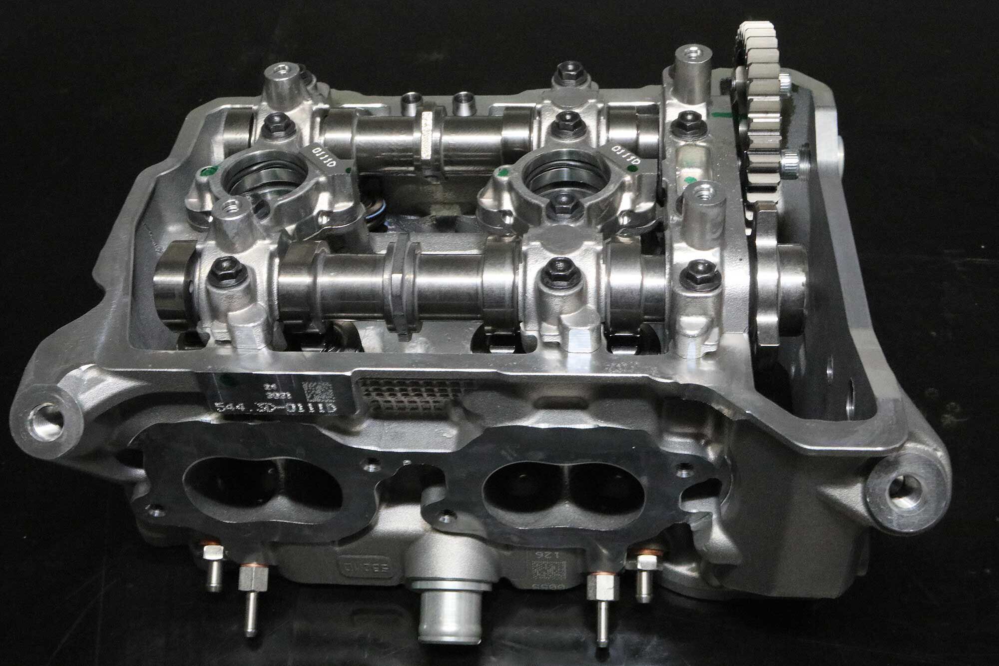 The V-4 Granturismo heads share the same basic castings and gear layout, a rational choice applied even given the different valve-actuation systems.
