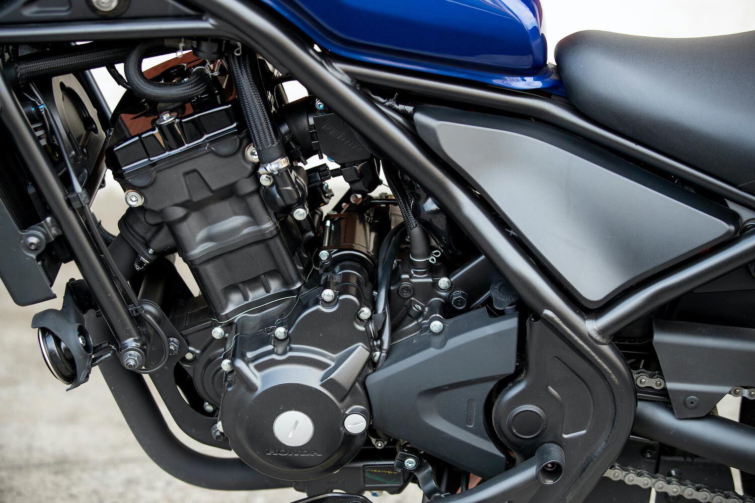 A diamond-type frame holds the engine in place.