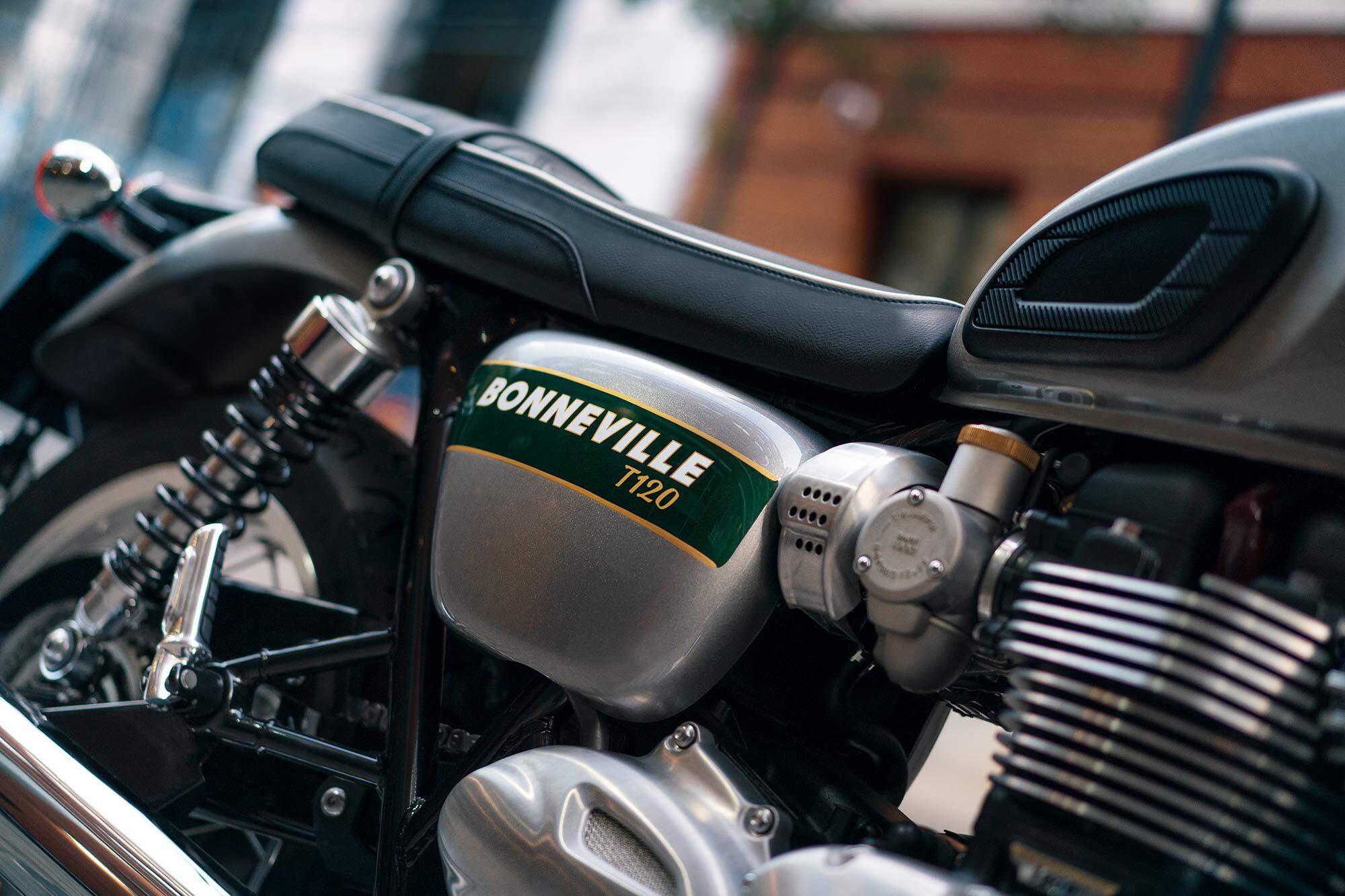 Gold and green badging with hand-painted pinstripes come on the 2022 Bonneville T120.