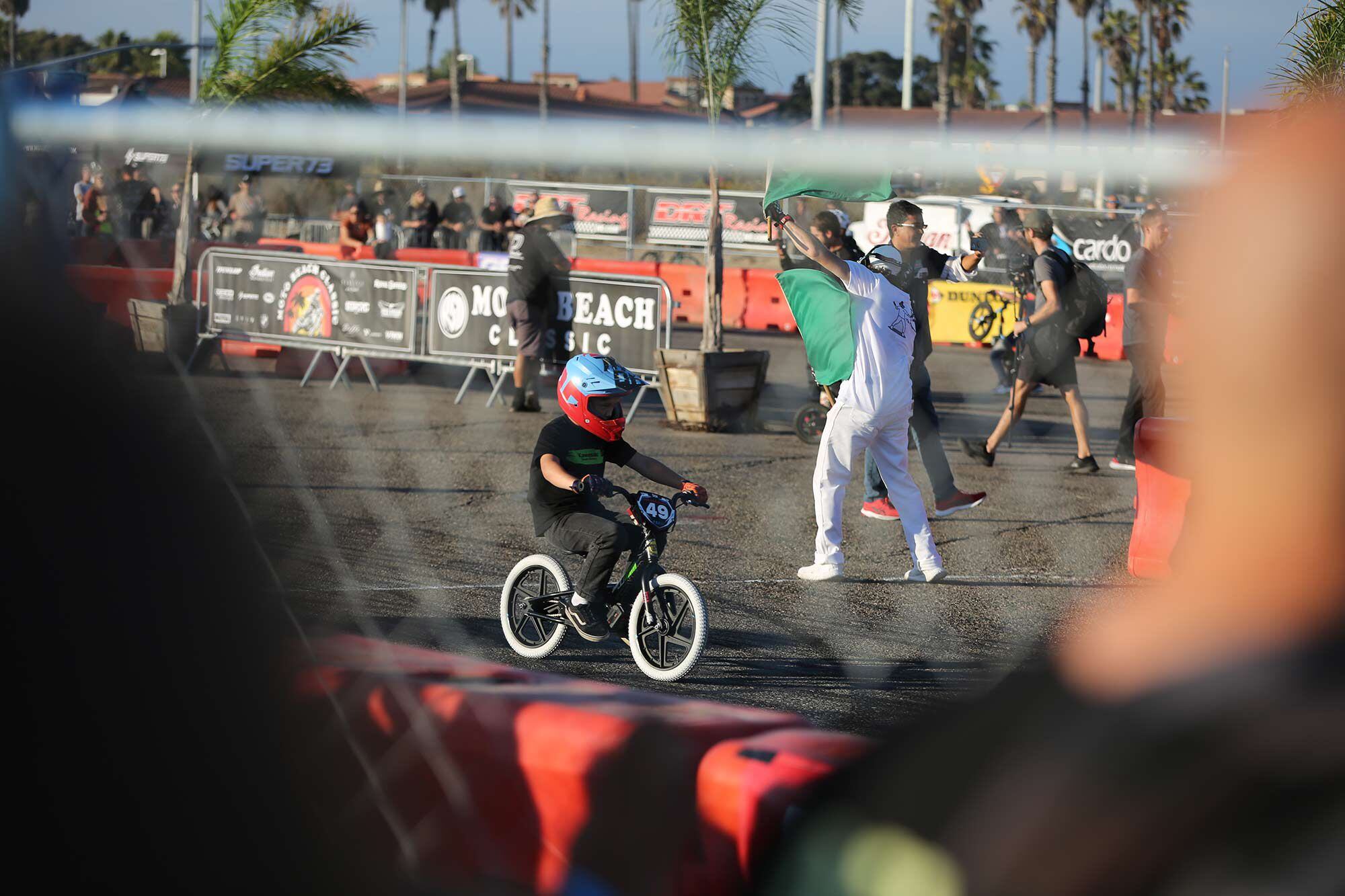 The kids pushbike race is always a crowd pleaser.