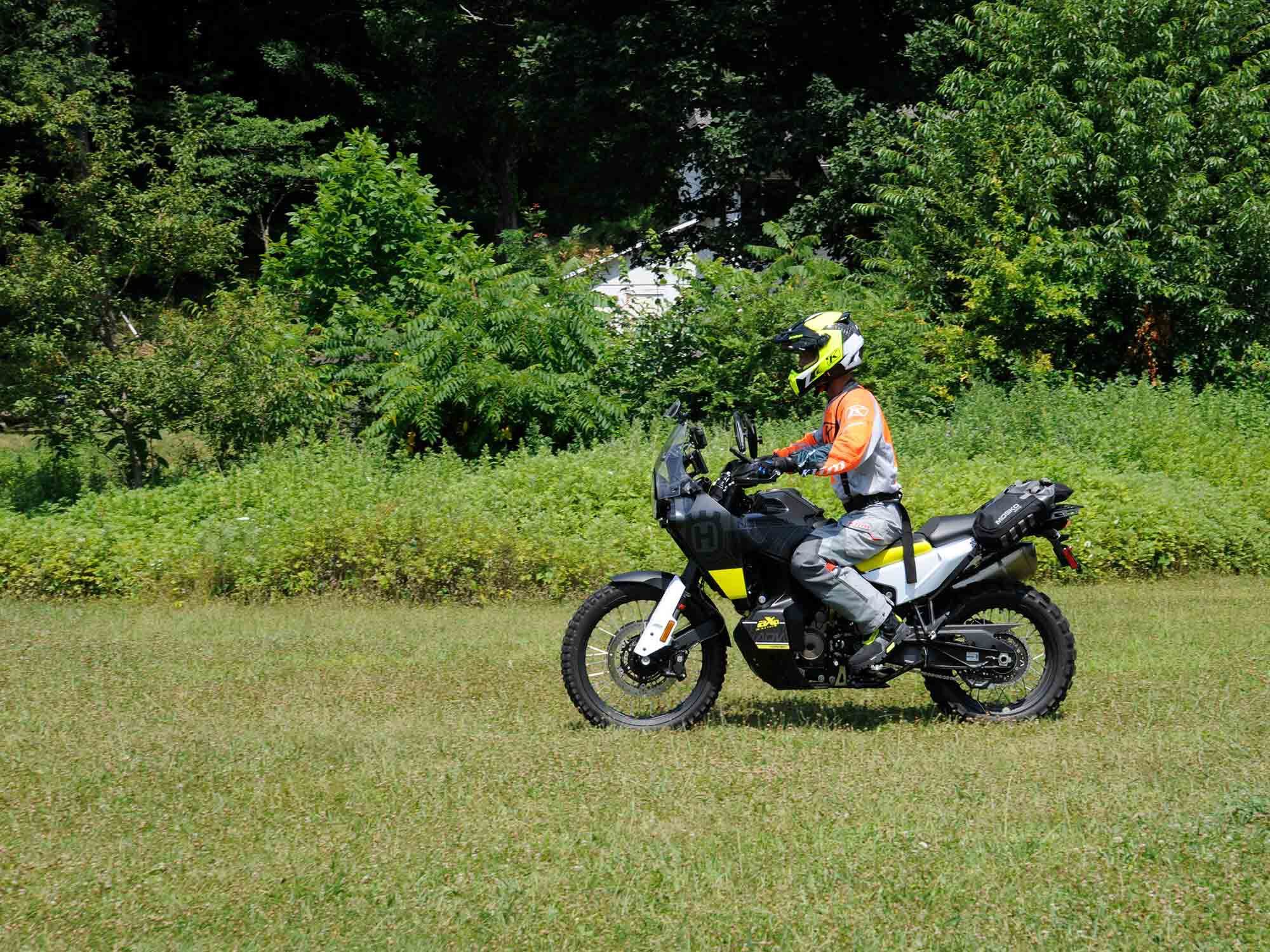 The Dirt Bike Academy’s Ufberg shows the students one of the sitting drills from aboard his Husqvarna Norden 901.