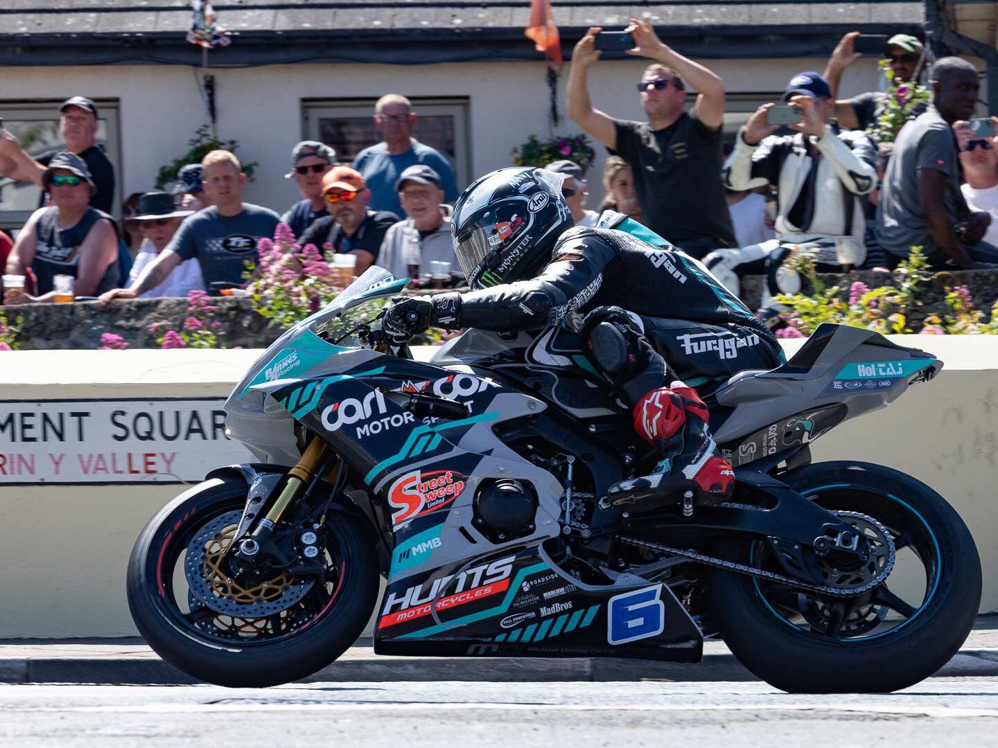 Aboard his MD Racing Yamaha YZF-R6 BN6, Dunlop won both Supersport events. In the second race, he set a new course record of 130.4 mph finishing nine seconds ahead of Peter Hickman.