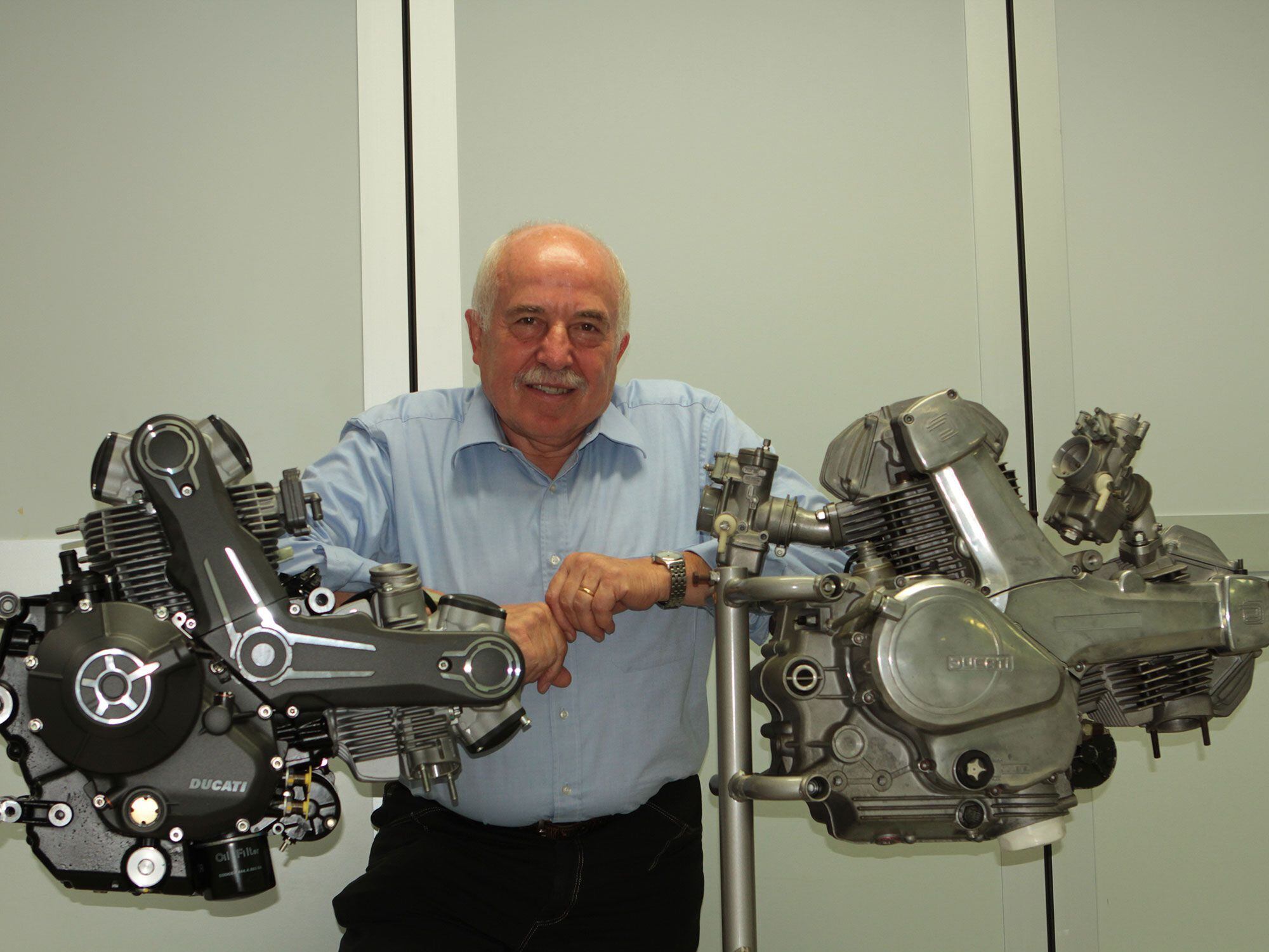 Dr. Gigi Mengoli with an original and modern version of the air-cooled SOHC twin. He had a part in every version.