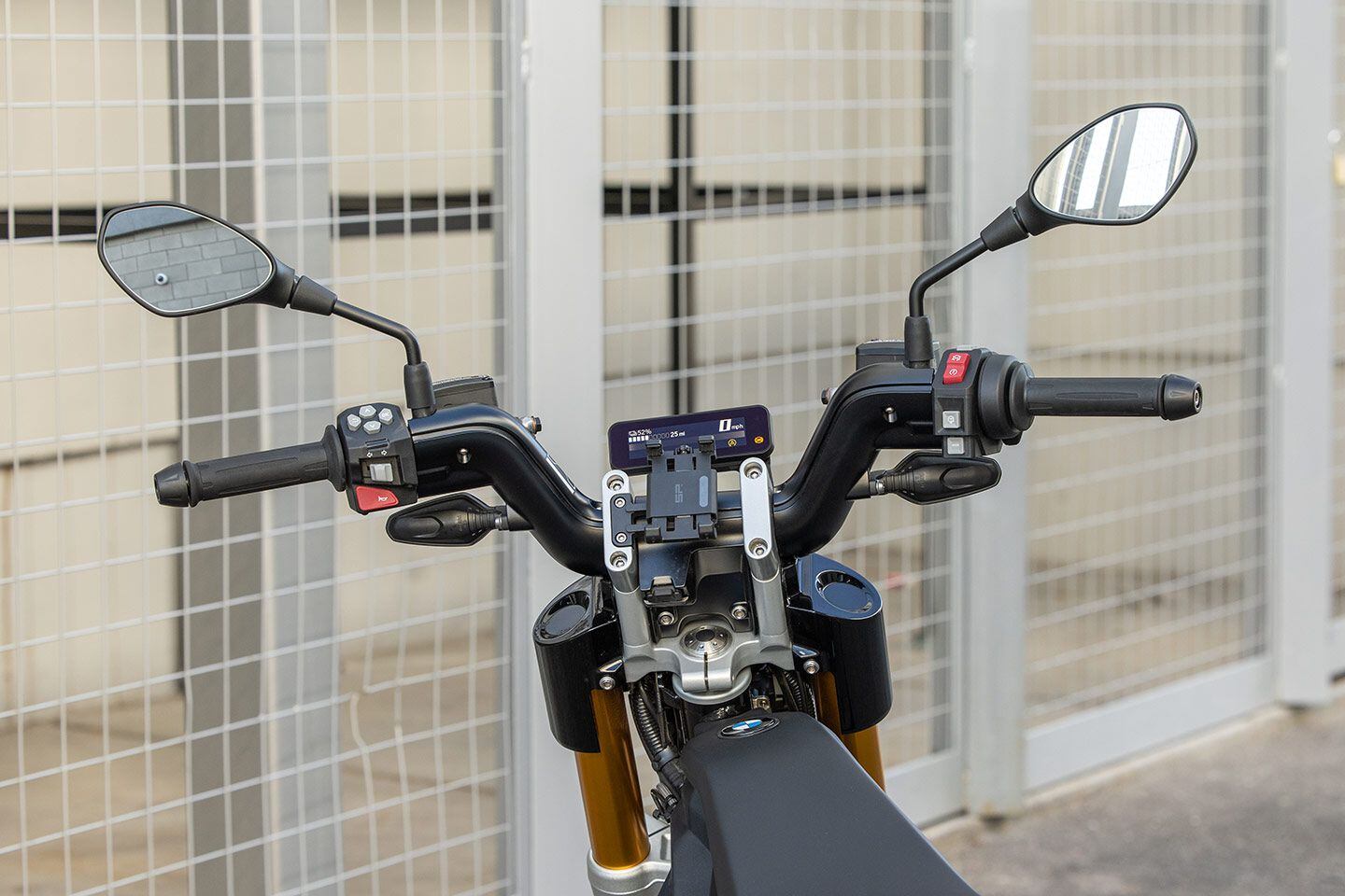 Highline package includes phone mount and BMW Connected Services, which allows for checking charge status via the app. The BMW Ride Connected app can be controlled through the buttons on the left switch cluster and the user’s phone becomes an extension of the gauge package to include navigation and ride recording. USB-C port lies below the handlebar.