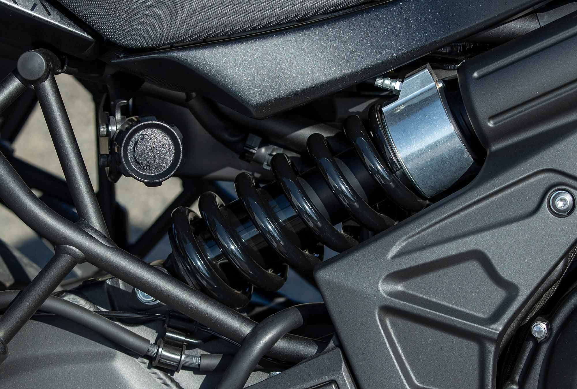 The back of the bike features a single offset lay-down shock offering 5.7 inches of travel with remote adjustable spring preload.
